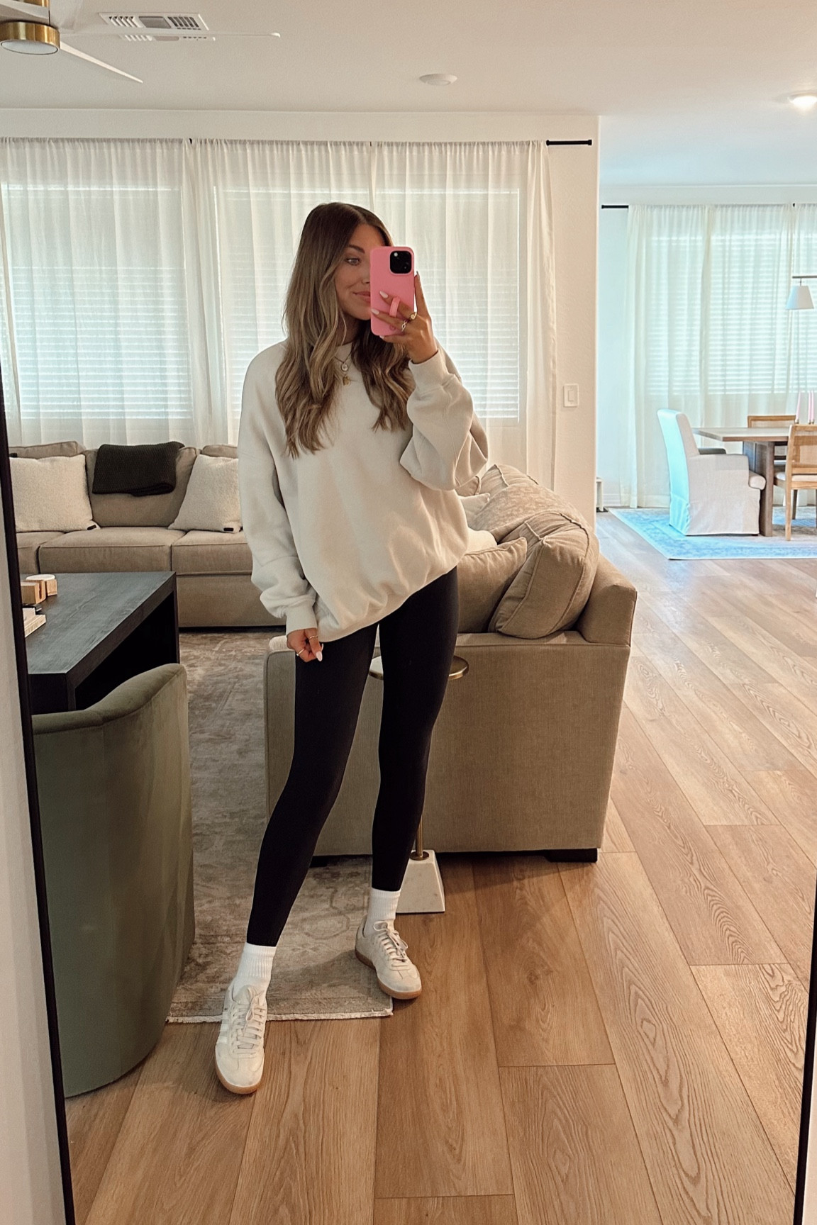 Comfy travel outfit! Abercrombie sweatshirt is men’s I’m wearing a large. Lululemon align leggings wearing a size 4. Adidas sambas I sized down a 1/2 size and Amazon crew socks 