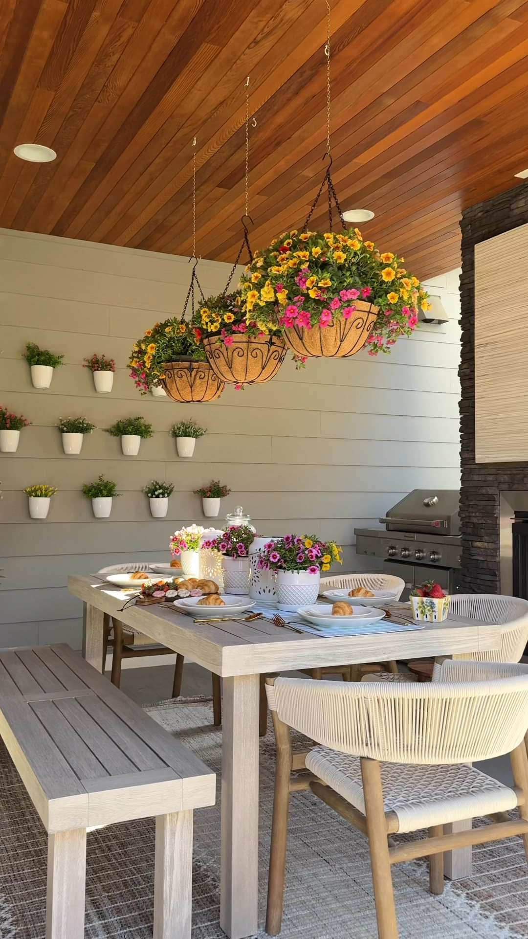 Getting the patio ready for summer! It's finally starting to hit 70 degrees here and I can't wait for lots of alfresco dinners and summer parties out here! Pressure washing our patio and grill is definitely a must!
#patioseason #pressurewashing #outdoorspace

outdoor chairs and rug, lanterns, hanging planters, artificial flowers, home finds, patio furniture, outdoor furniture 

#LTKSeasonal #LTKSummerEdit #LTKHome