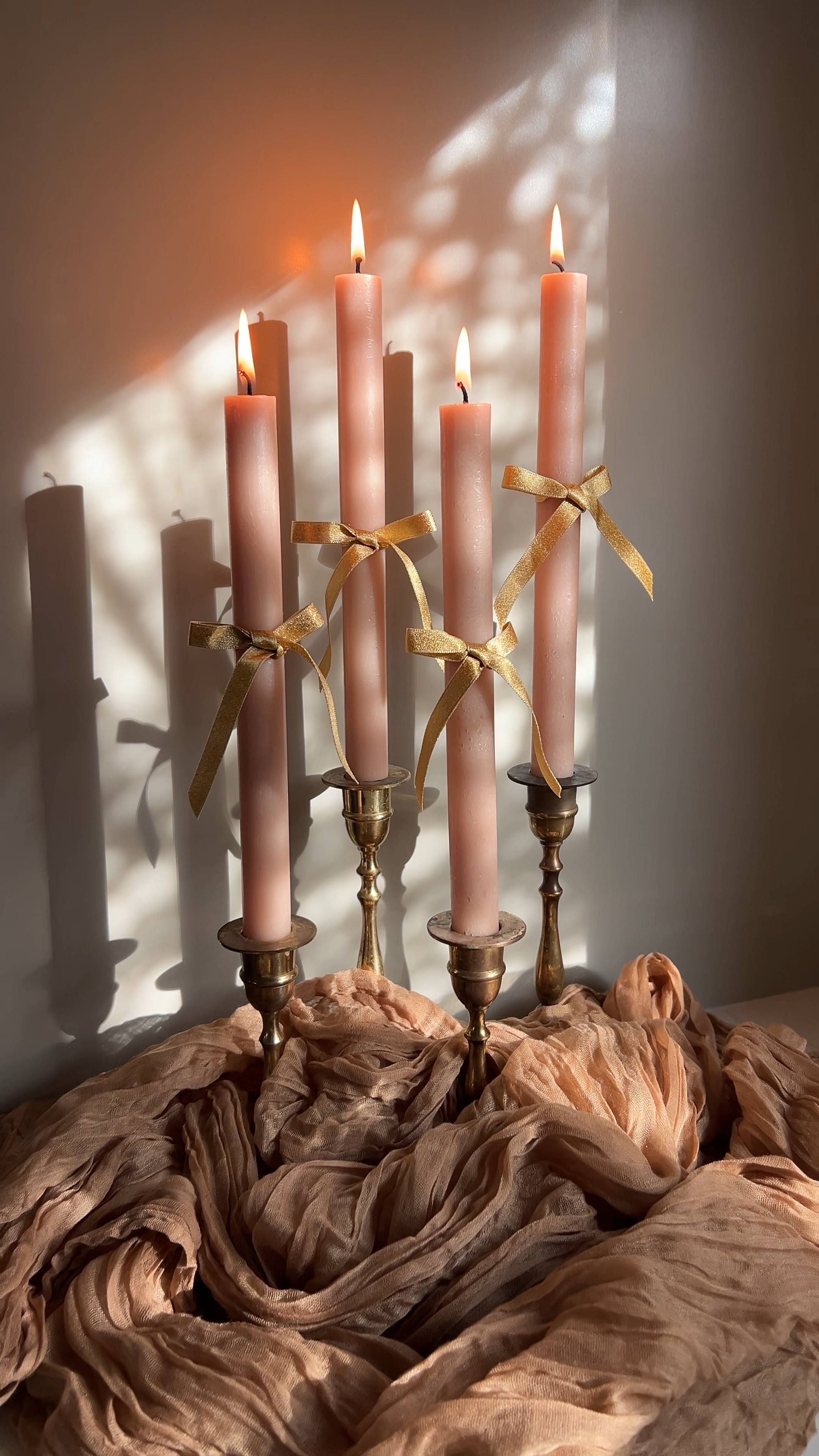 Of course I had to add a gold bow to my new tapered candle sticks!! 
They make for a gorgeous and easy centerpiece. 

Target hearth and hand table decor tablescape centerpiece gold brass accents candles cheese cloth table runner bows 

#LTKHome #LTKFindsUnder100 #LTKWatchNow