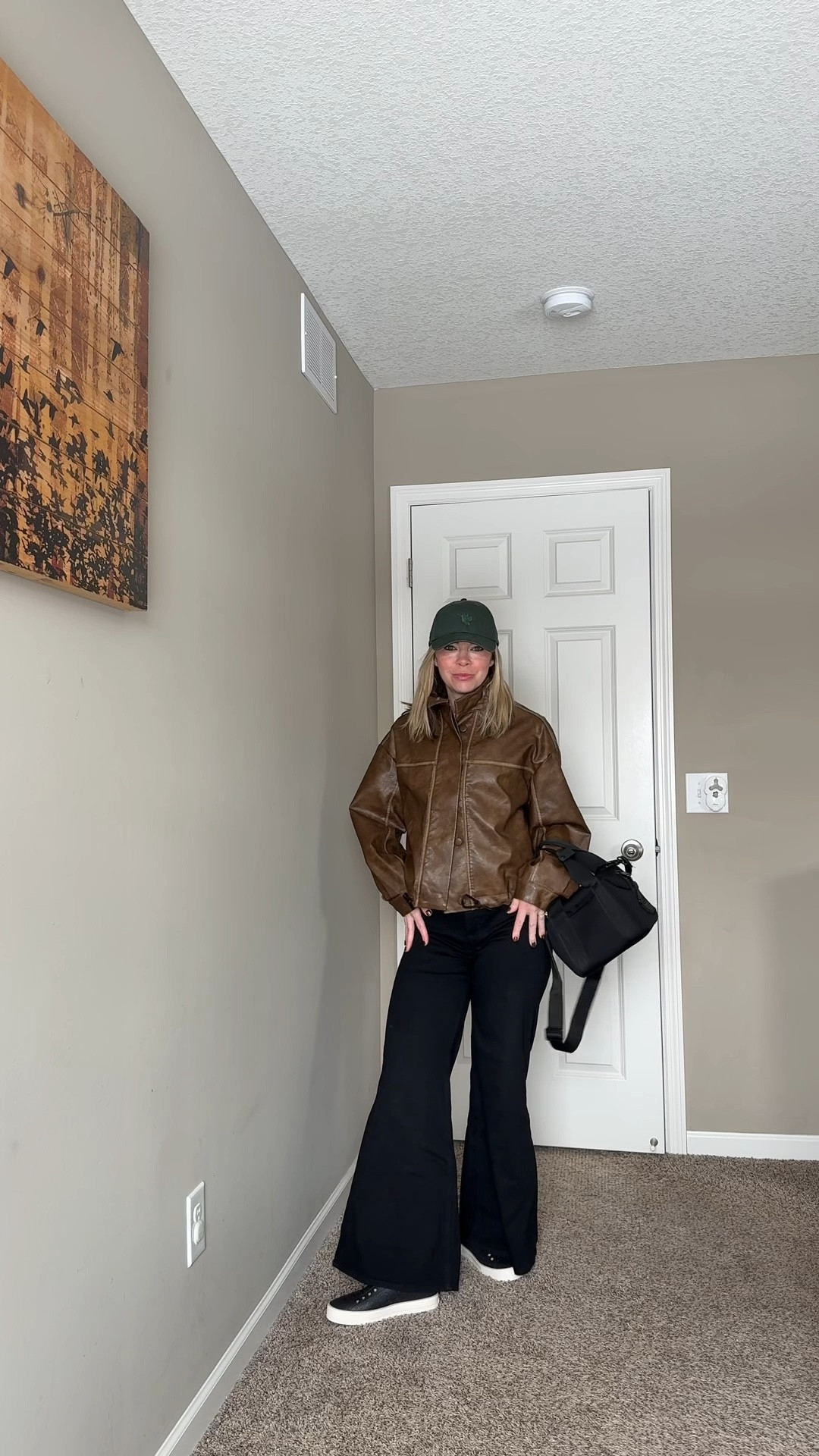 Current favorite outfit formula. Structured jacket + relaxed wide leg pants = comfy but still look put together.

This cropped leather jacket adds shape while the flowy trousers keep everything easy to wear for errands, school drop off, or casual plans. One of those outfits that feels styled without effort.

Outfit details linked including wide leg pants, leather jacket, everyday sneakers, and basics I wear on repeat.

everyday outfit, casual chic outfit, mom outfit ideas, wide leg pants outfit, spring layering outfit, effortless style, relaxed outfit inspo

#LTKootd #LTKmomlife #LTKPetite