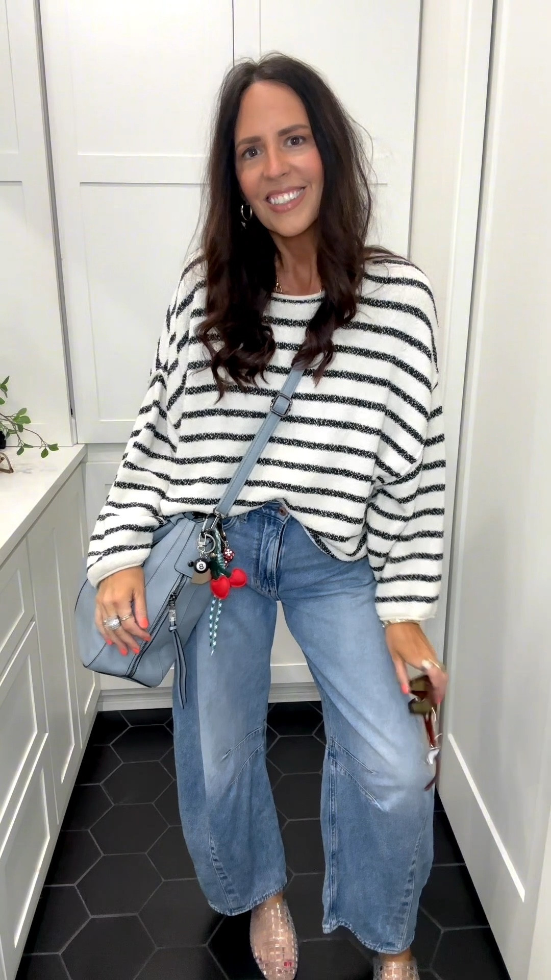 Top: vintage free people 
Bag:Amazon 
Bag charms: Amazon 
Jeans: Gap size 6 tall 
Shoes: old navy size 9 ( 8.5 is normal size) 

#LTKootd #LTKTall #LTKOver40