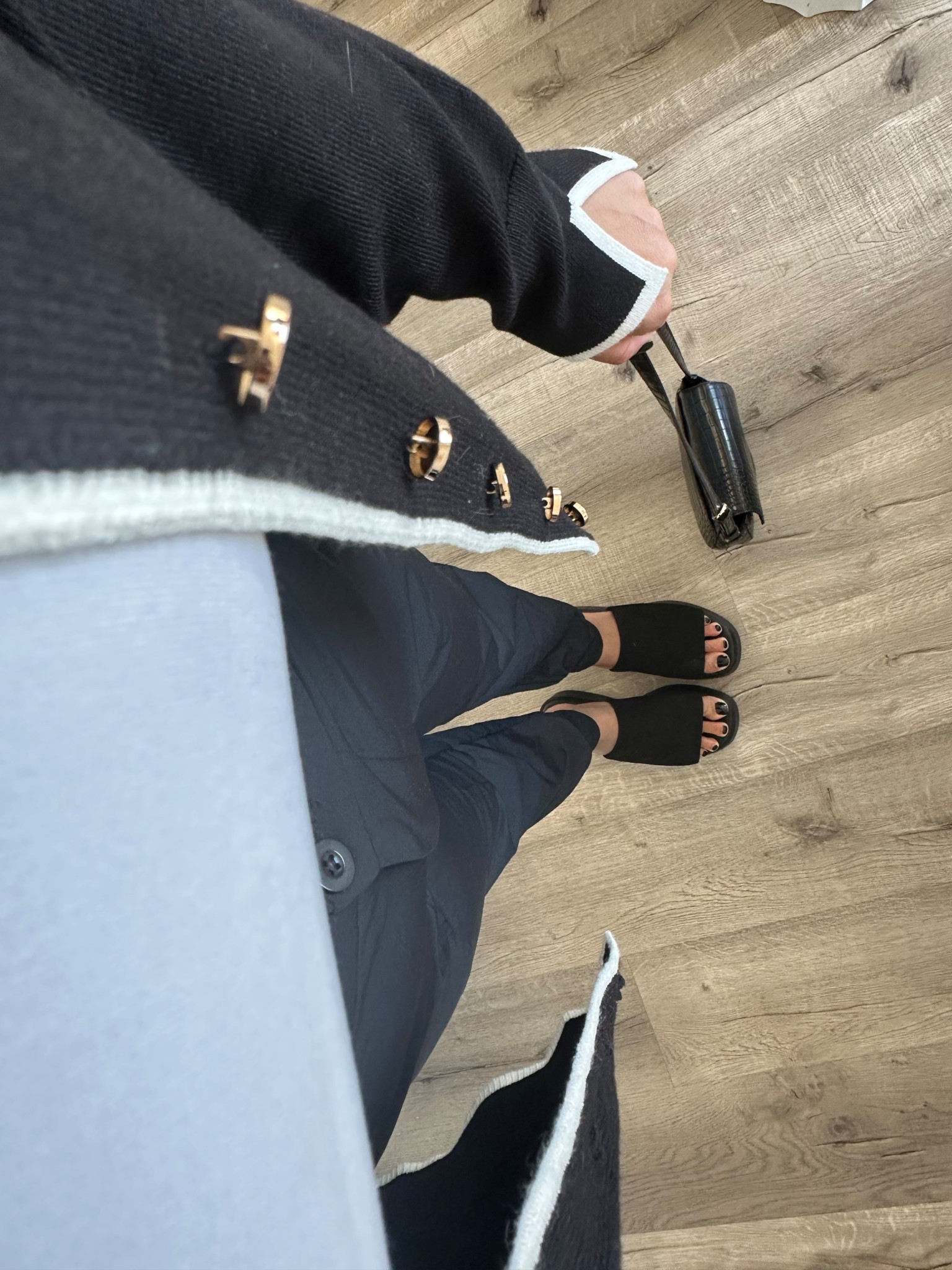 So obsessed with this black and white sweater! I mean look at those sleeves and gold buttons! It goes so well with joggers slacks, snake skin black purse, and platforms! Guaranteed to get the job with this look🖤 

#LTKStyleTip #LTKFindsUnder100 #LTKWorkwear