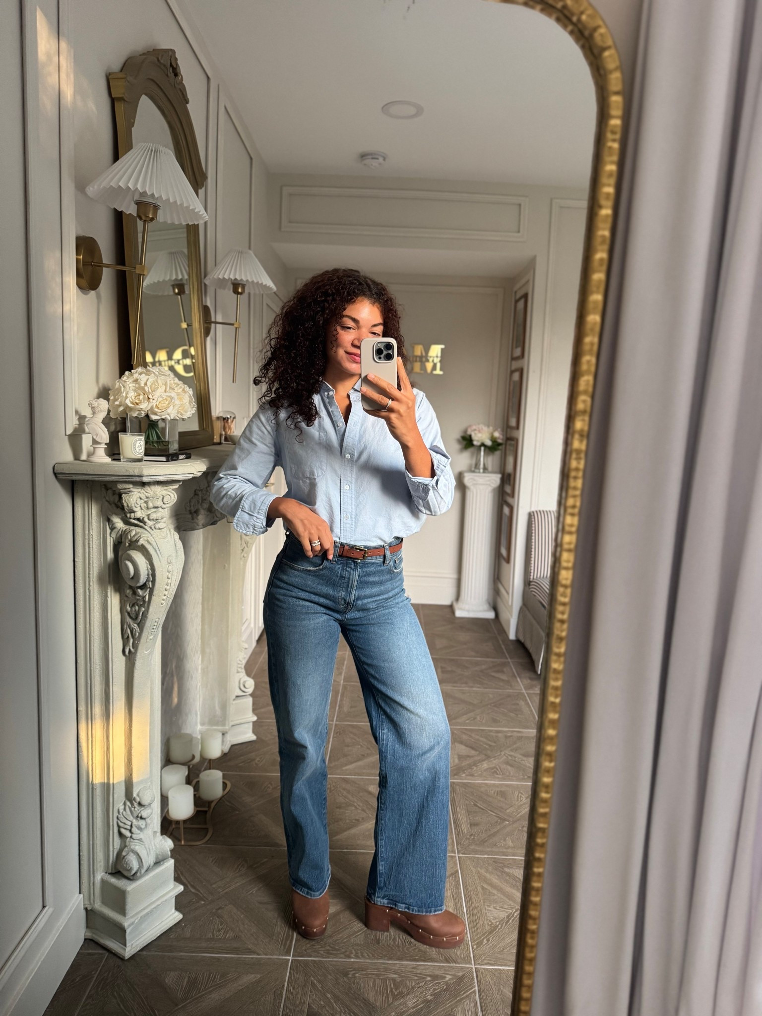 Fall outfit idea: light blue oxford, wide leg jeans, stud heel clogs, brown belt 

#LTKStyleTip #LTKSeasonal