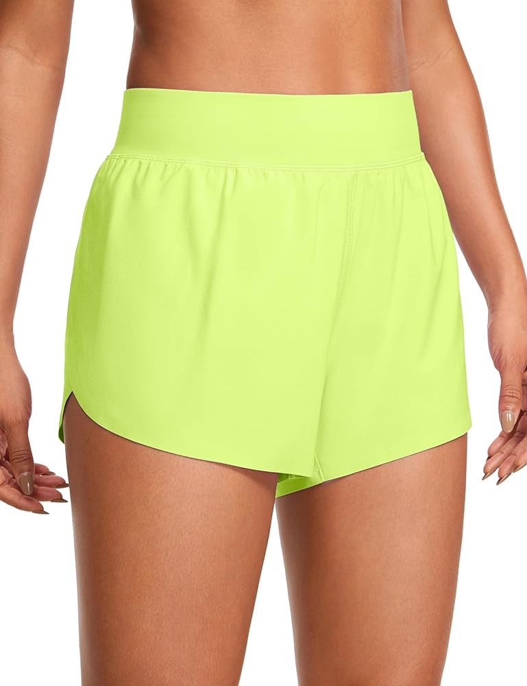 CRZ YOGA High Waisted Dolphin Athletic Running Shorts for Women High Split Comfy Mesh Liner Gym W... | Amazon (US)