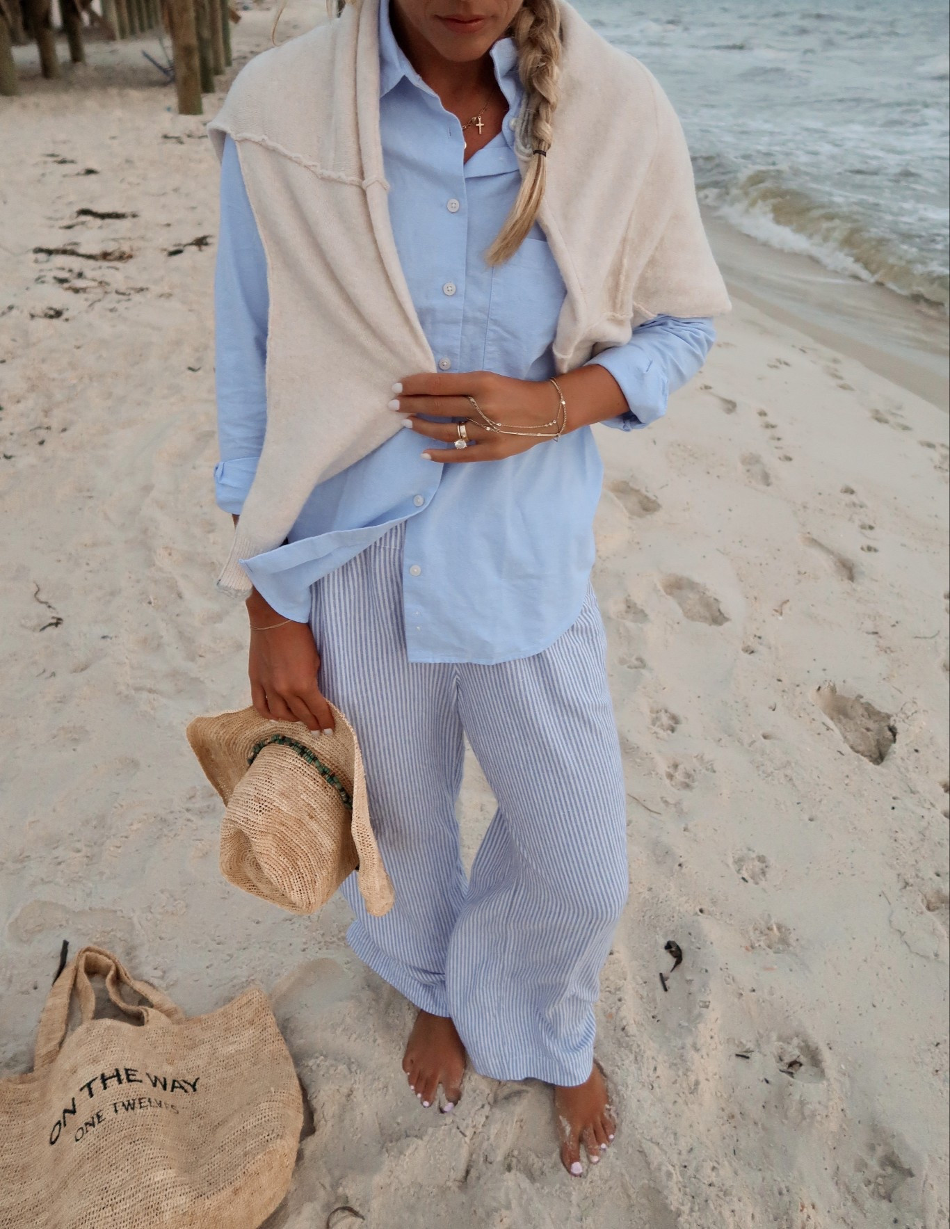 size small in button up shirt and size small in sweater! bag is on my ShopMy (in insta bio) pants in a small (i’m 5’10)

#LTKSeasonal #LTKTall #LTKFindsUnder50