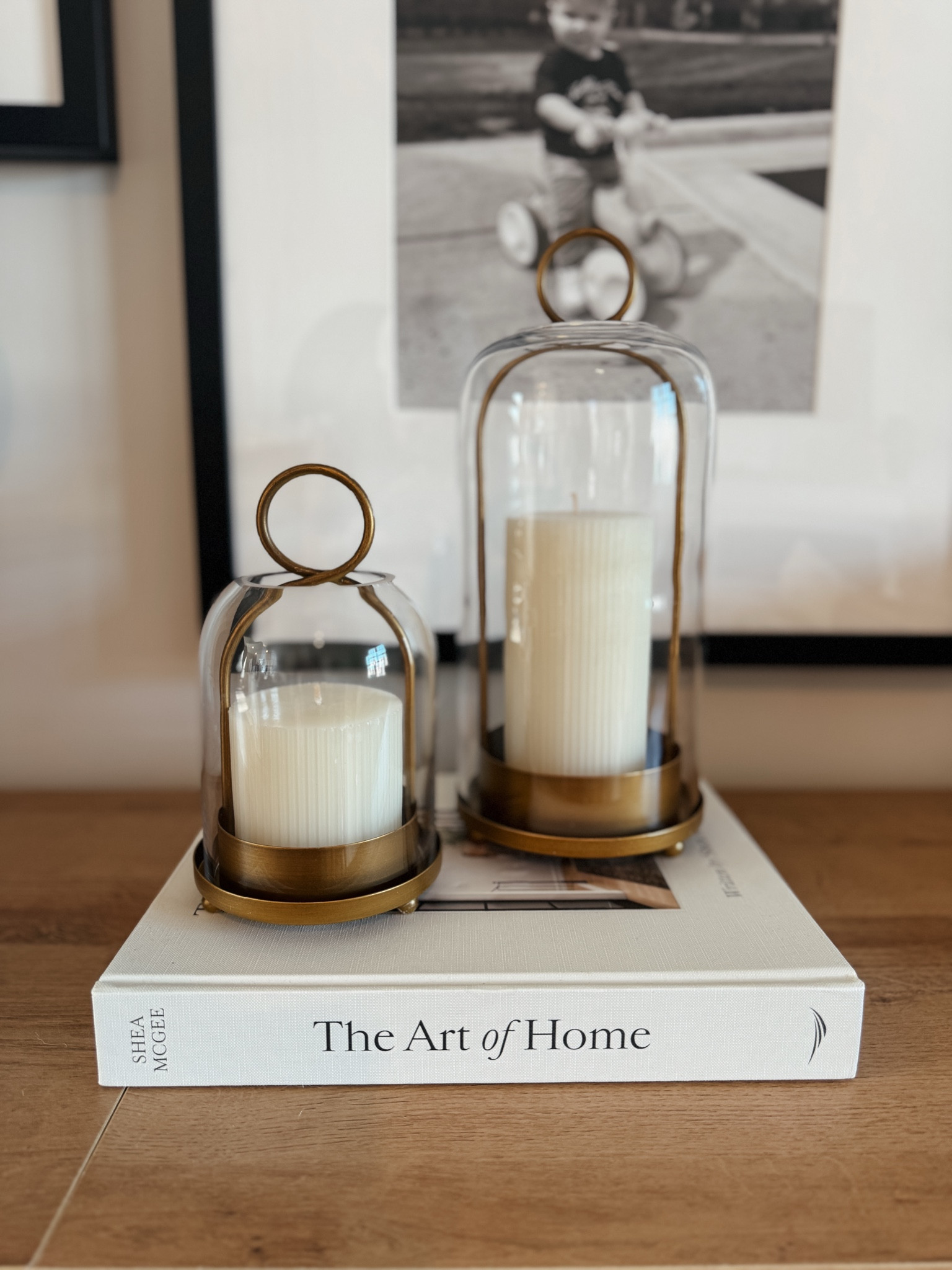 Simple, cozy details that make a space feel finished 🤍

These glass cloche candle holders are one of my favorite easy styling pieces layered on a coffee table book. The warm brass + soft ivory candles keep everything feeling calm and lived-in without trying too hard.

ltk: glass cloche, brass decor, candle holders, neutral home decor, coffee table styling, decorative books, cozy home accents

#LTKHome