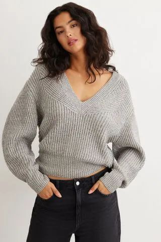 Long Sleeve V-Neck Irregular Ribbed Sweater | Dynamite Clothing