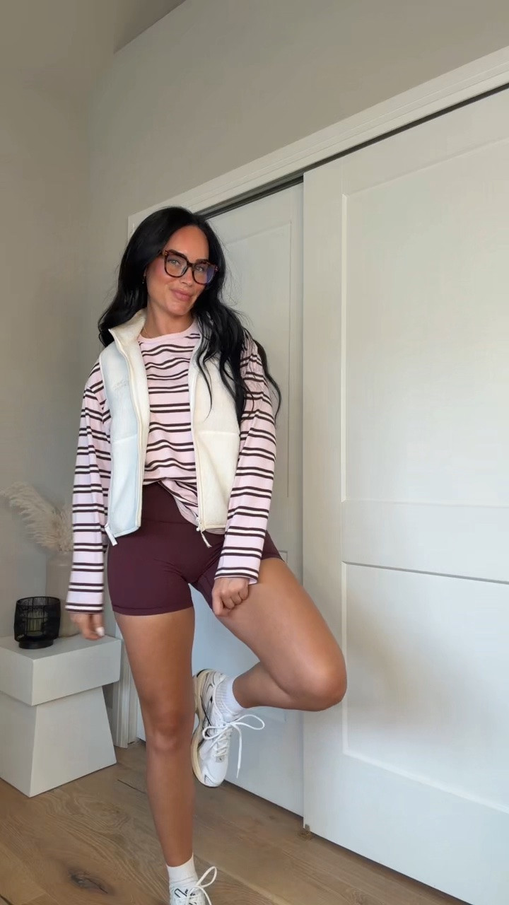 The cutest fall athleisure look 🍂♥️ I’ll have all the outfit details over on my LTK!

My sizing: 5’7”, 145 lbs, 32DD
I’m wearing a size small tank, size small long sleeve, size medium white vest, size small plum vest, and size 6 shorts.

@Aritzia #FallOutfit #FallAthleisure #AritziaStyle #CasualFallOutfit #FallFashion fall athleisure outfit, Aritzia fall outfit, fall layering outfit, casual fall style, comfy fall outfit
