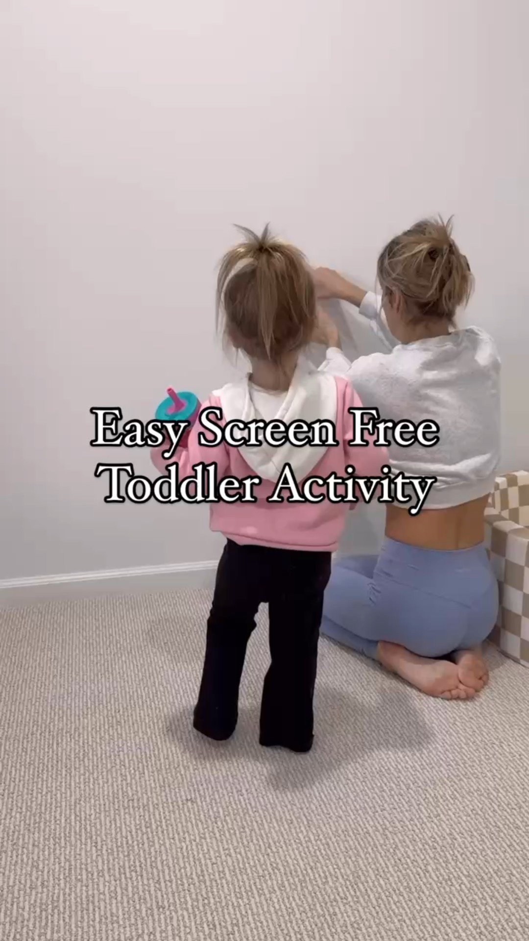 Screen-free fun that keeps them moving 🙌 Tape some balls to the wall and let your toddler race to collect them in a bag—great for burning energy + building motor skills! 🏃‍♀️✨ #ToddlerActivities #ScreenFreePlay #LTKfamily #LTKkids #LTKmoms