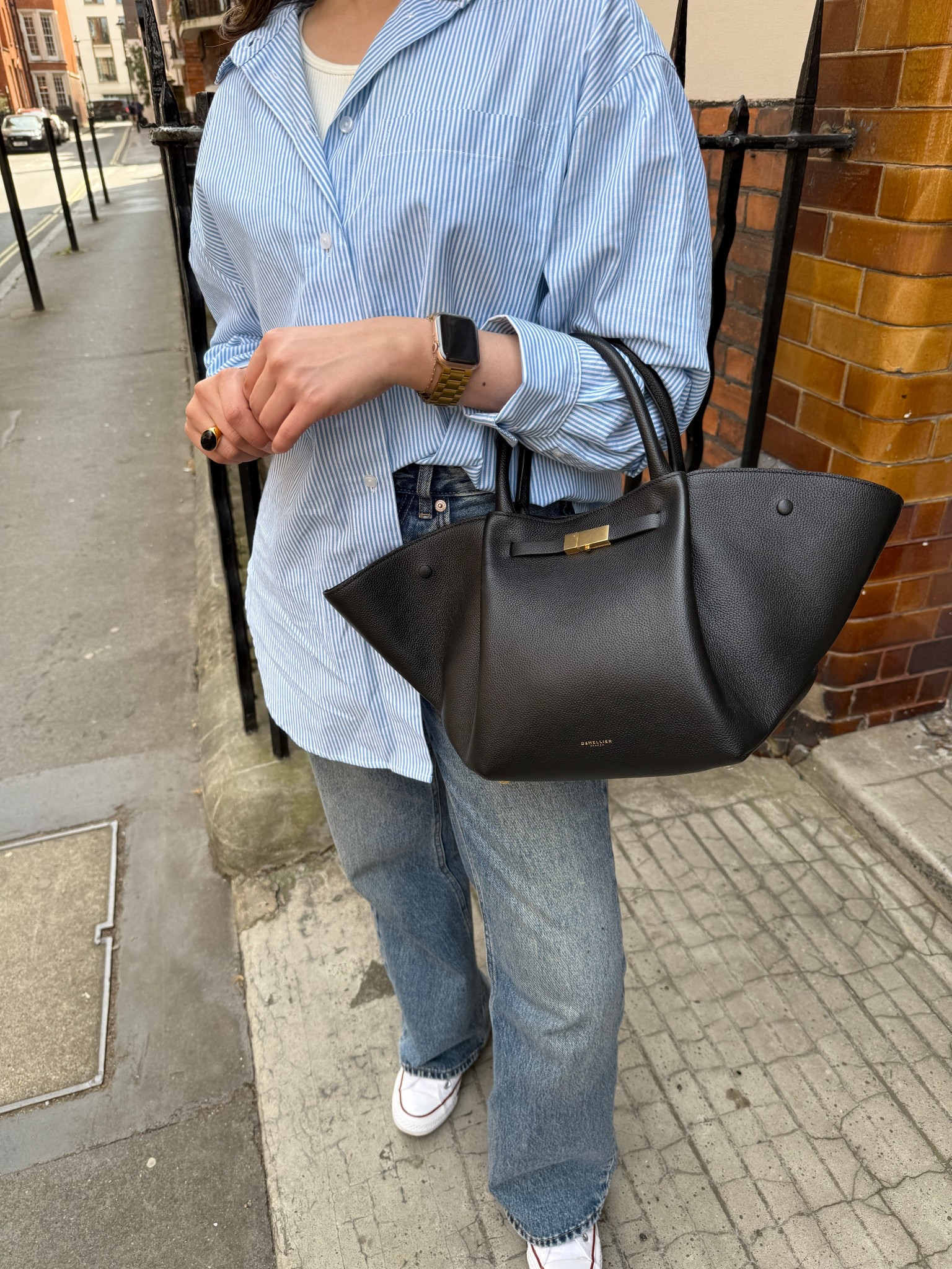 Spring/summer causal outfit inspo.
An oversized shirt is a must and I paired it with these petite jeans and my go to city demellier New York bag and converse.

#springoutfit #oversizedshirt #jeans #casualchic #demellier 

#LTKbag #LTKeurope #LTKpetite