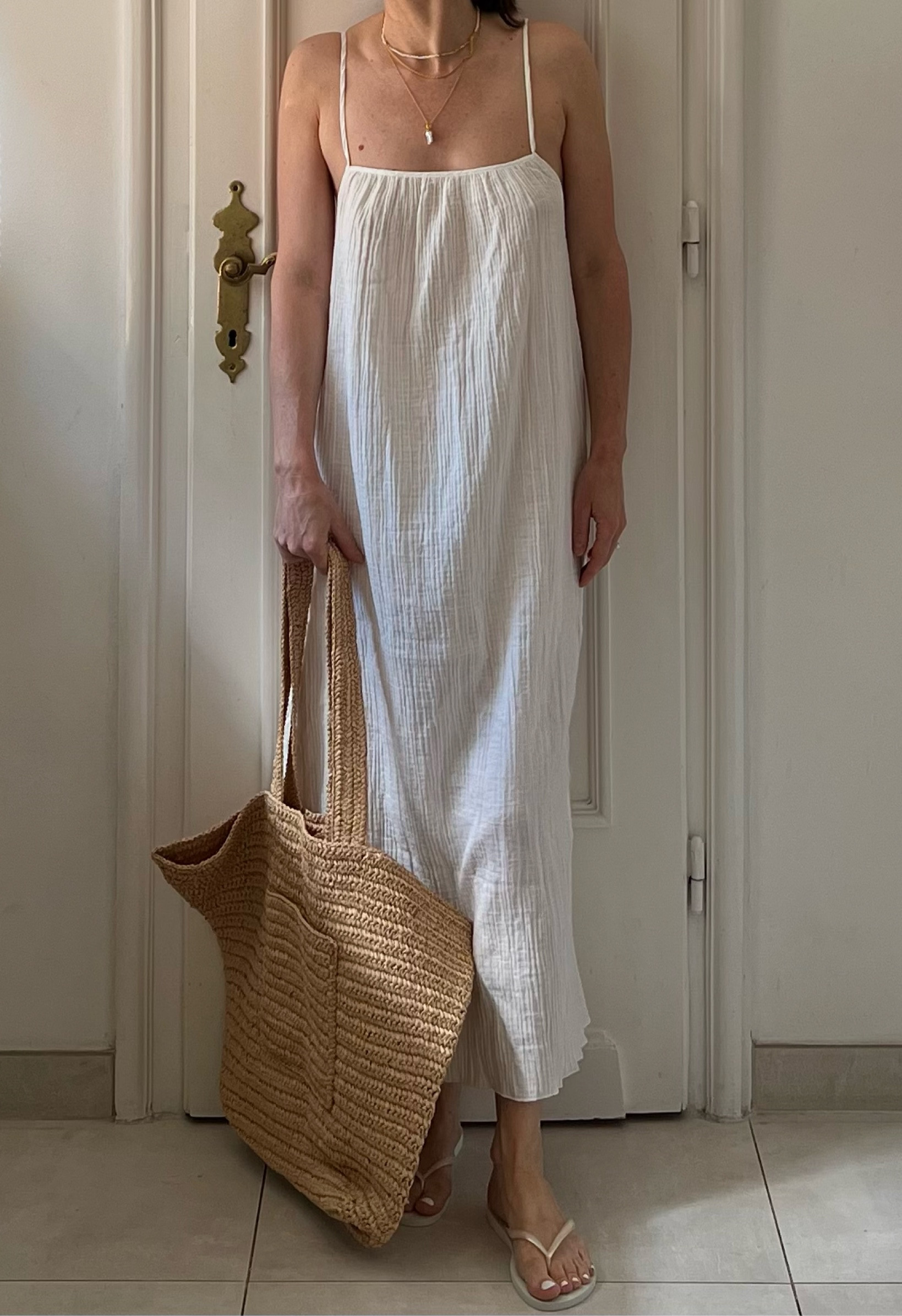 Summer dress, dresses summer, beach dress, summer outfit, white dress, maxi dress, white maxi dress, holiday outfit, holiday essentials, overdized bag, beach bag, paper bag, raffia bag, flip flops, Havaianas flip flops

#LTKsummer #LTKuk #LTKbag