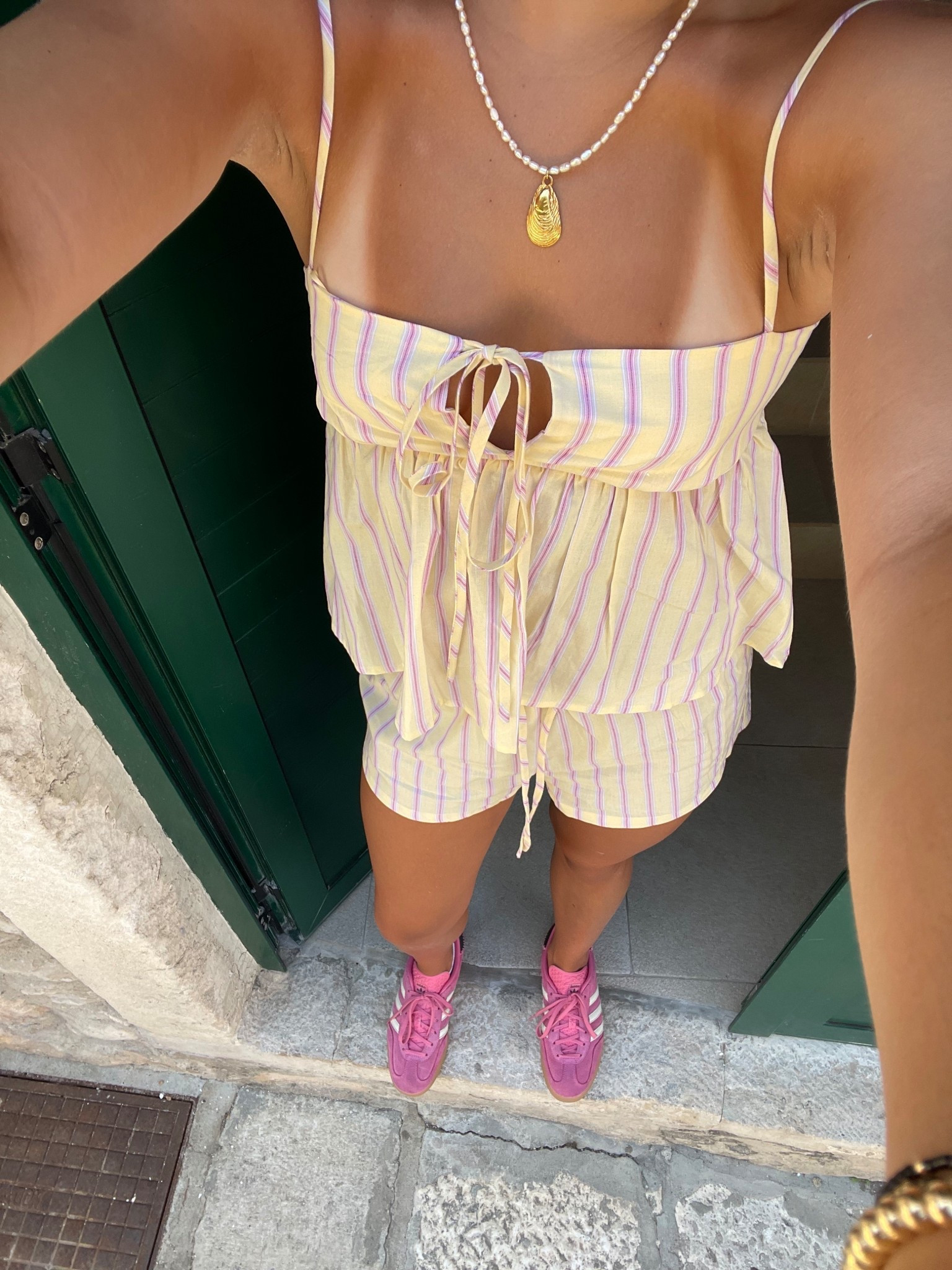 yellow and pink set with pink shoes
pink adidas
pink sneakers
butter yellow set
shorts set 

#LTKFindsUnder100 #LTKStyleTip