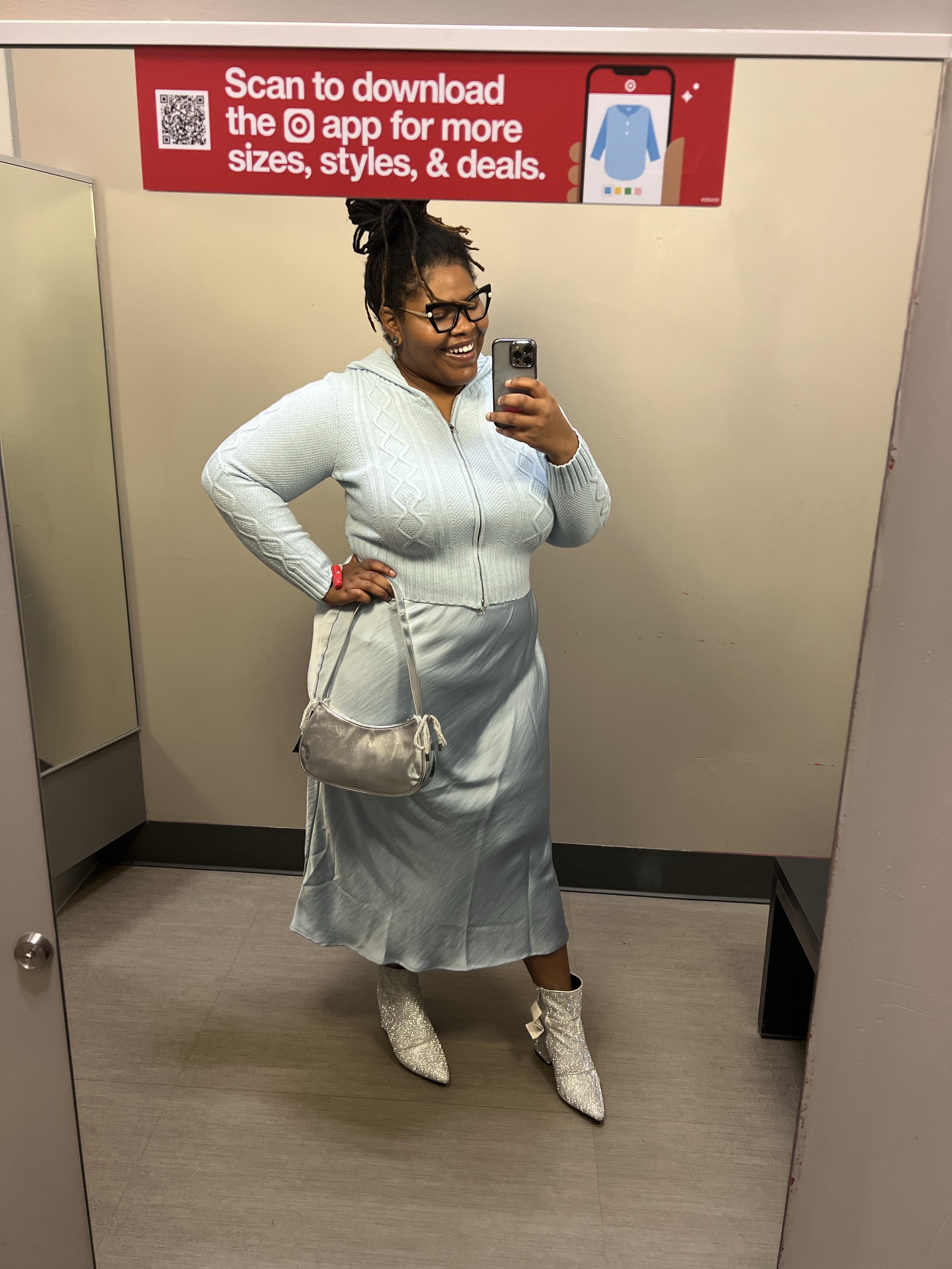 Effortless winter chic! ❄️ Loving this powder blue monochromatic look featuring a cozy cable-knit sweater and a satin midi skirt. Adding a little sparkle with these silver glitter ankle boots (hello, bow detail 😍) and a metallic shoulder bag. Perfect for turning heads while staying comfy! Shop the look and steal the style—perfect for holiday parties or casual glam days. 💙 

#LTKStyleTip #LTKPlusSize #LTKSeasonal