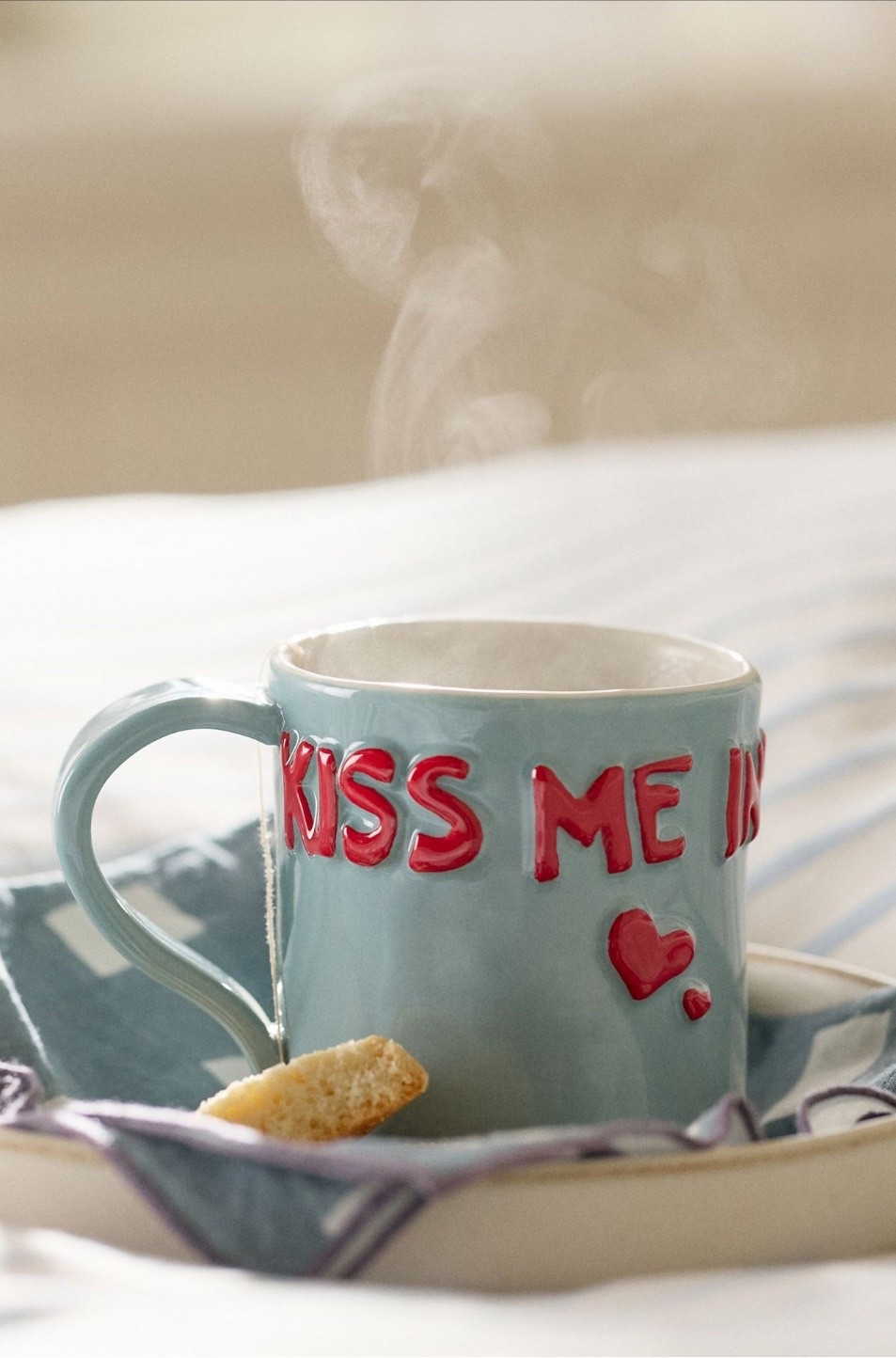 Anthropologie: This stoneware mug beckons with quippy phrases.
Art for the heart, the Breakfast in Bed collection from L&Clay; Ceramics celebrates the tenderness, excitement, and imperfections of love, sweet love. Expect imprints, sweet talk, red, pinks, and pale blue.

#LTKdayinmylife #LTKSeasonal #LTKmorningroutine