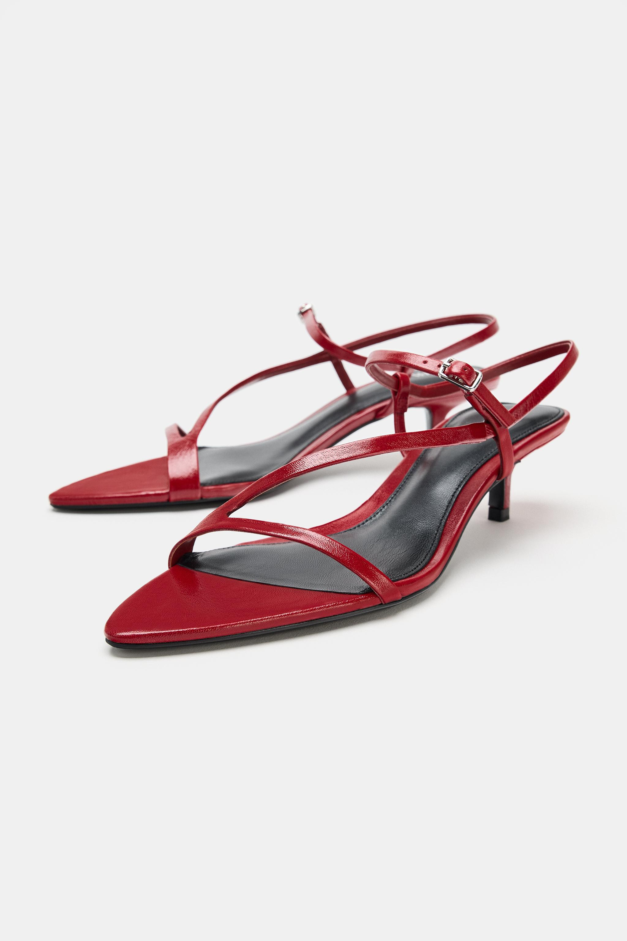 Model height: 181 cmLeather heeled sandals. Front straps. Ankle strap with buckle fastening. Kitt... | Zara UK