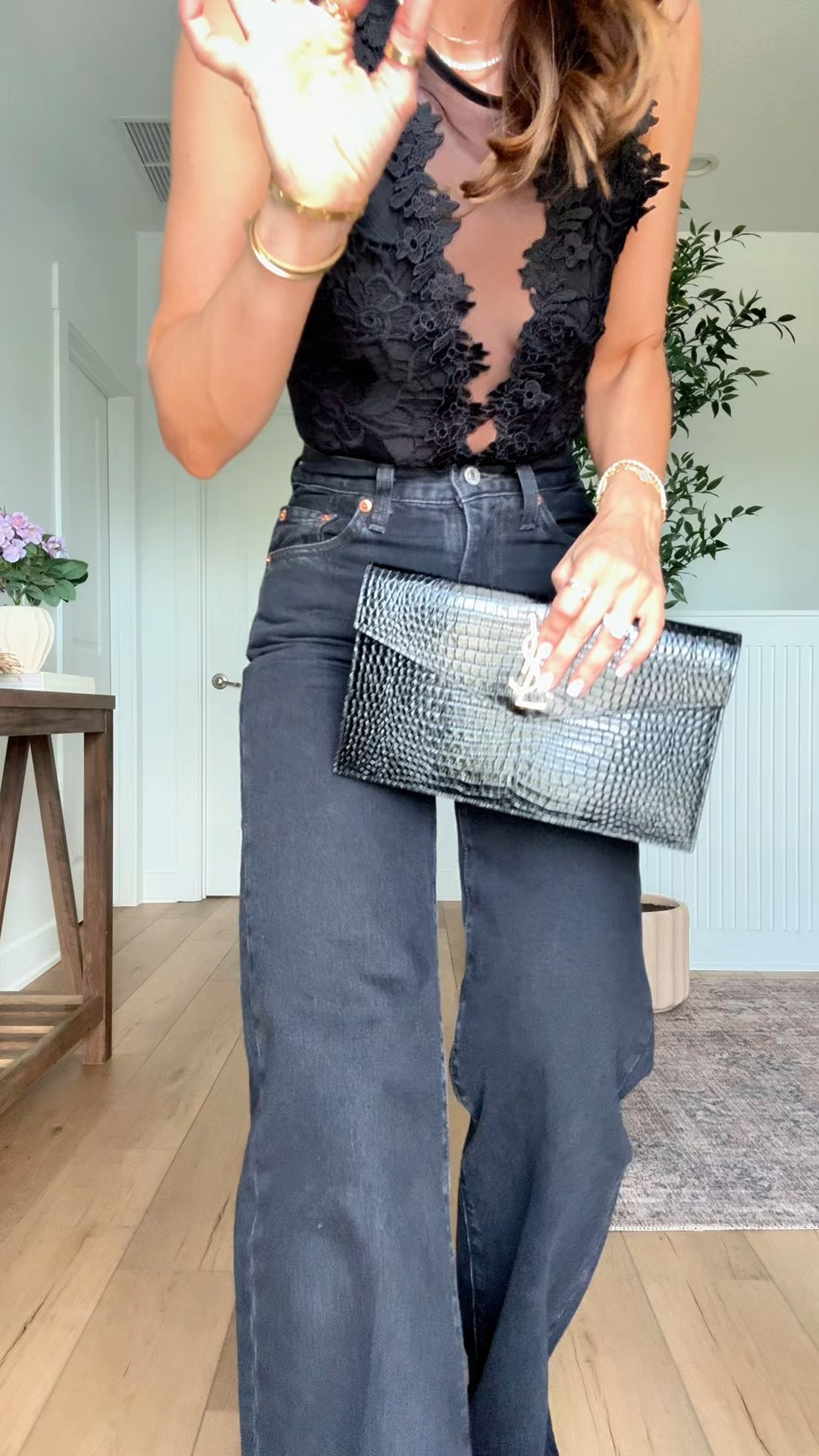 Amazon date night outfit. Amazon lace bodysuit in XS. Levi ribcage wide leg jeans in size 24, color is ‘Rosie Posie’. Gold heels are TTS. YSL clutch. Concert outfit. Girls night out. Dinner date. Vegas outfit. Party outfit.

#LTKootd #LTKPetite #LTKTravel