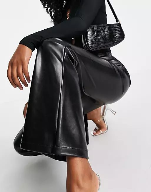 ASOS DESIGN straight leg pants in high shine faux leather with puddle hem in black | ASOS (Global)