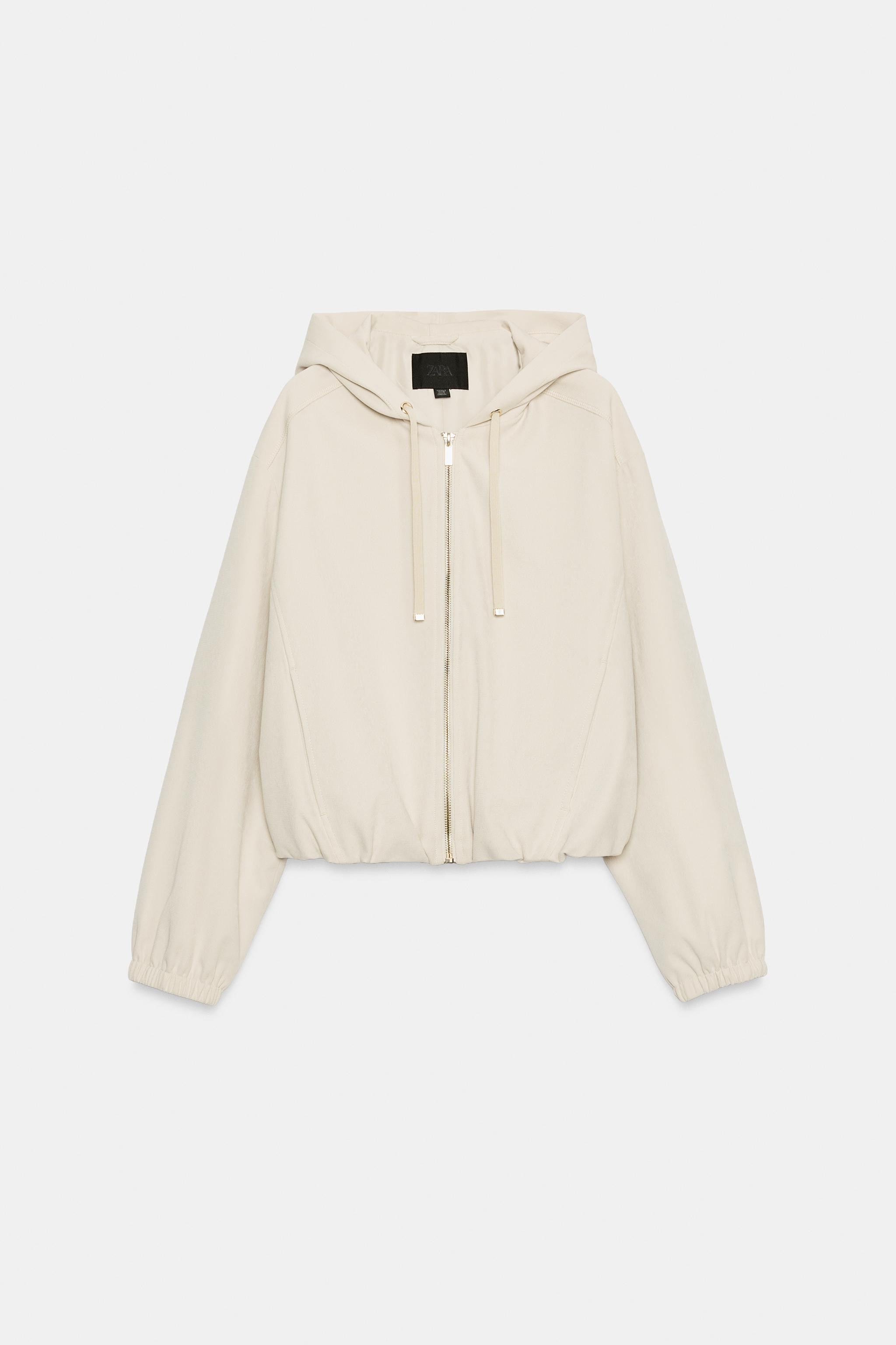 Bomber-style jacket featuring a hood with adjustable drawstrings, long sleeves with cuffs, front ... | Zara UK