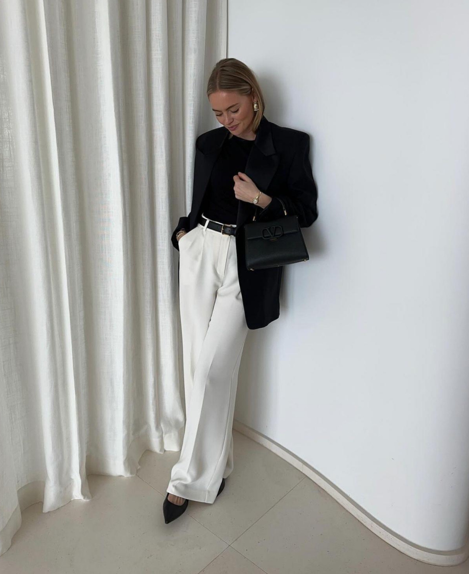Oversized black blazer, white tailored wide leg pleated trousers, black pointed court heels, black leather belt, Valentino black leather handbag

#LTKdatenight #LTKuk #LTKFashionMonth
