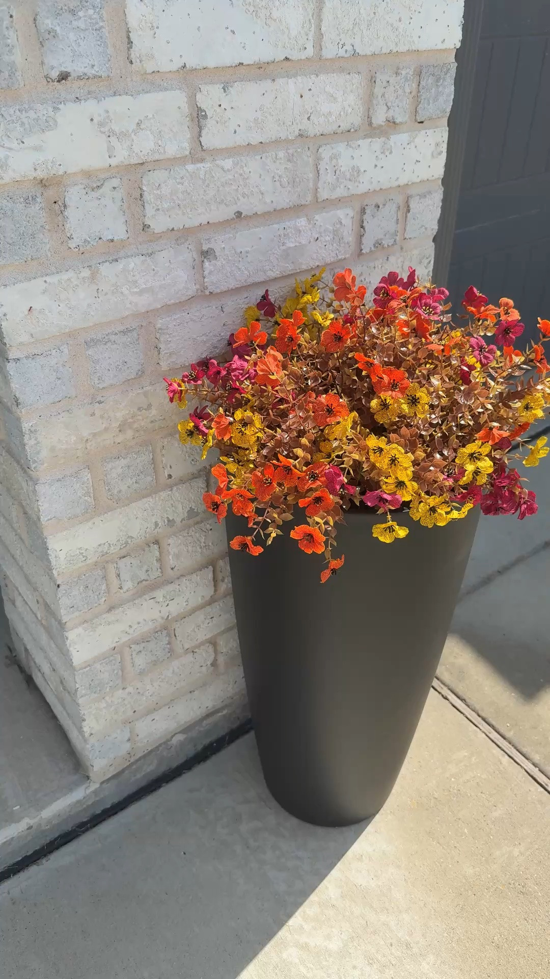 Fall faux flowers, uv rated for outdoors! 36 stems for under $30... I filled 3 of these pots with one pack!