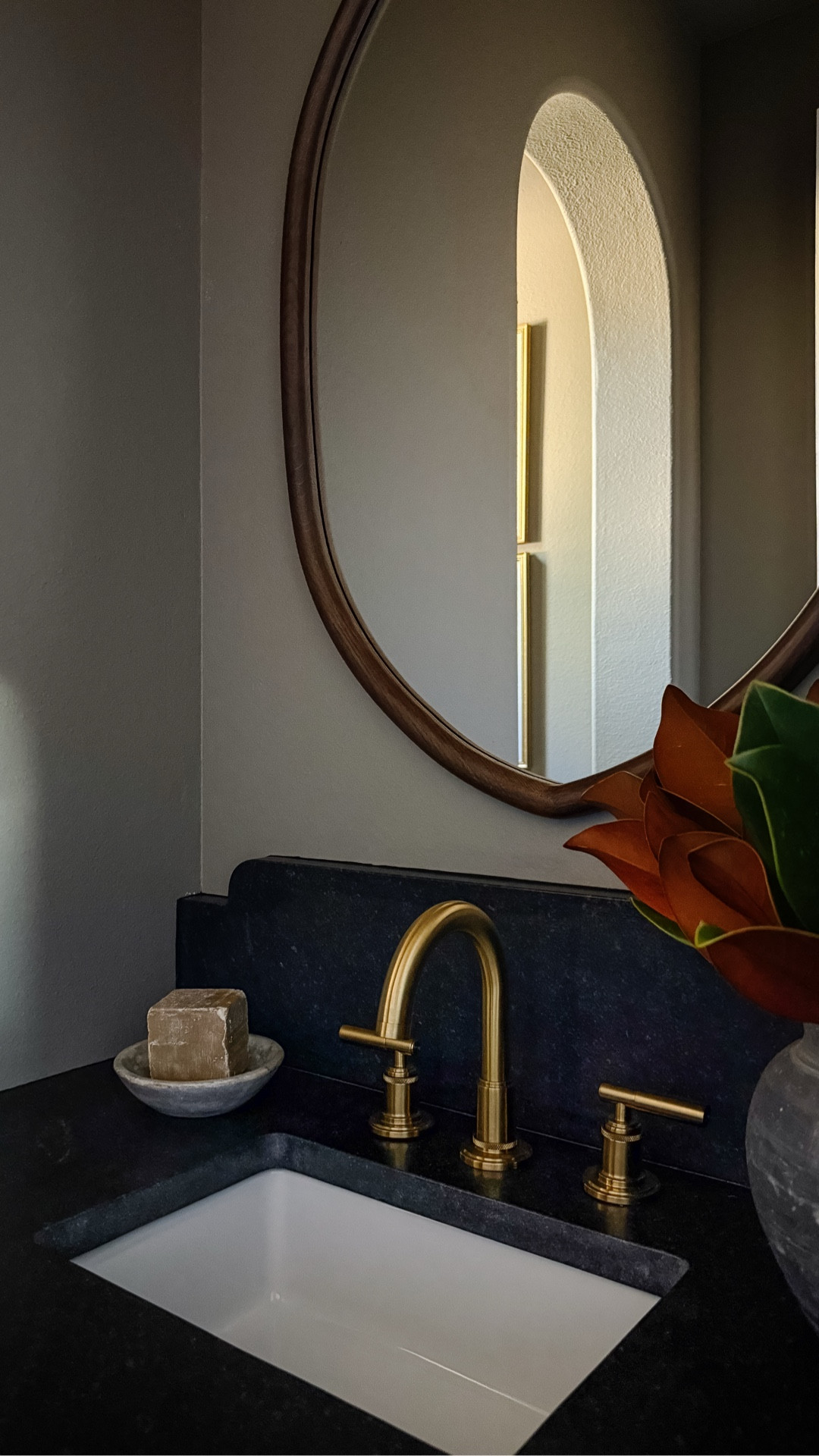 Our small and moody powder room makeover

This mirror is an exact match to a much more expensive designer version!

oval wood mirror, brass bathroom faucet, brass vanity lights, bathroom decor, moody bathroomm



#LTKHome