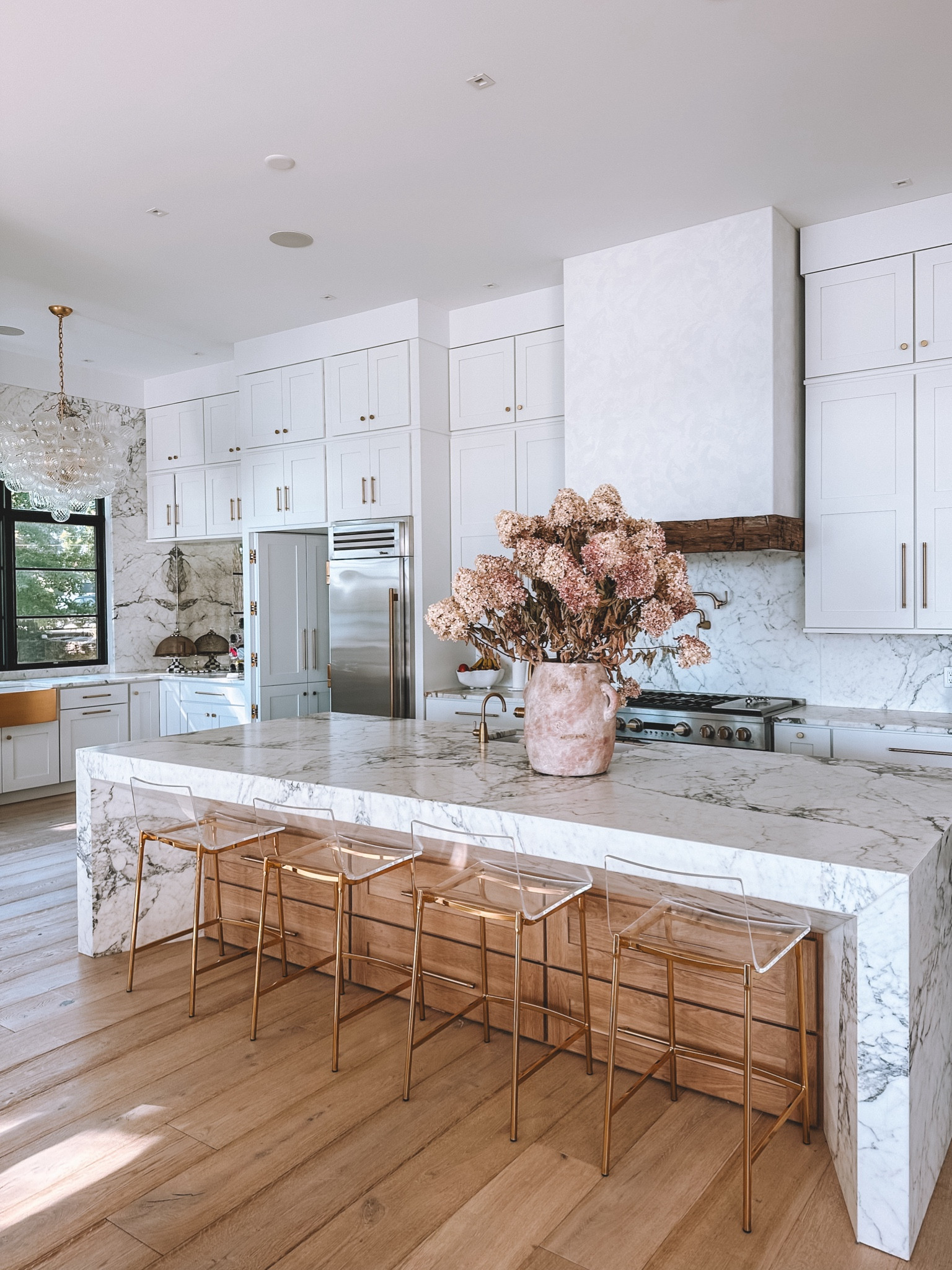 Counter stools and chandelier linked ✨