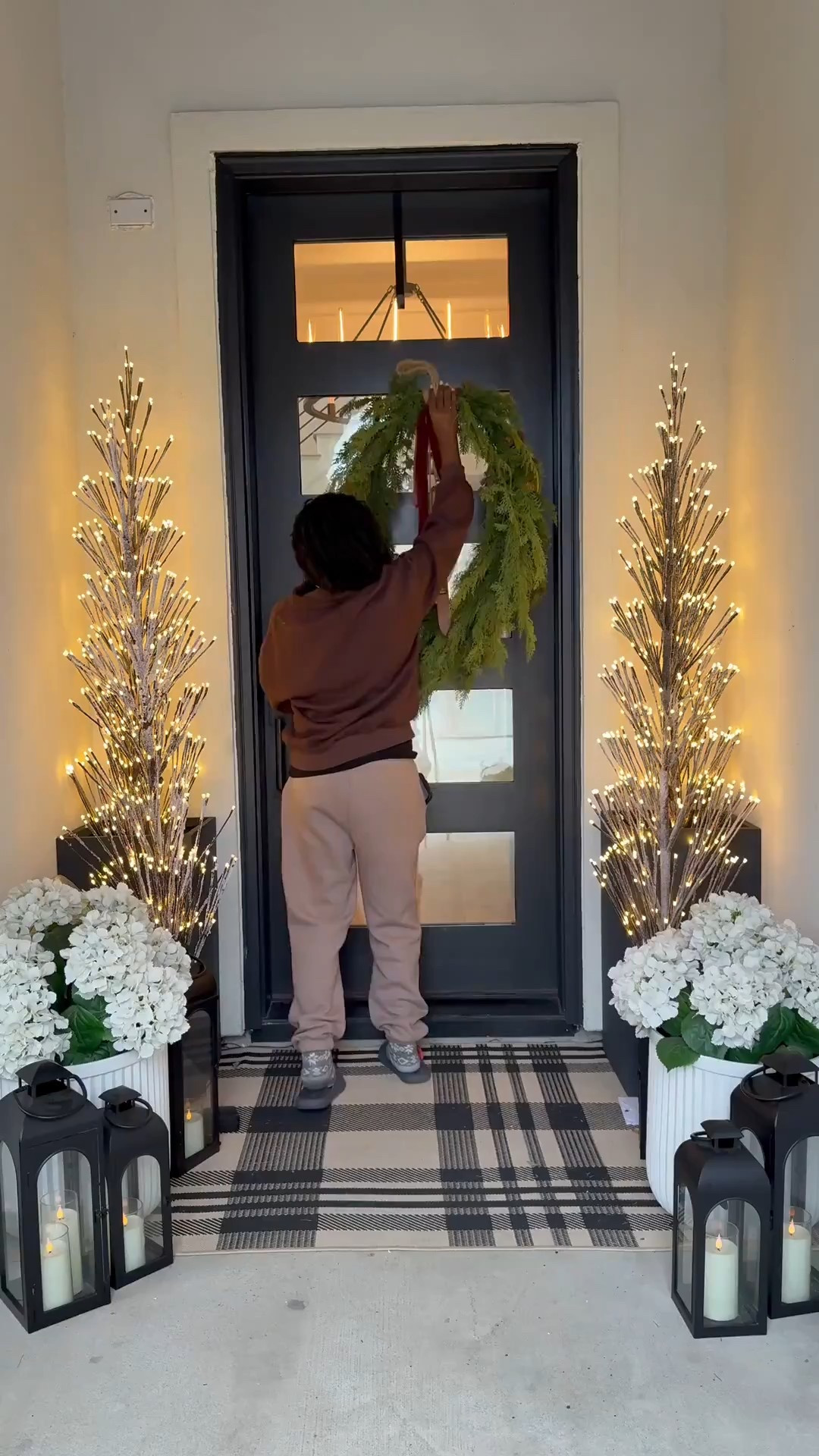Want to effortlessly elevate your home decor with the changing seasons? ☺️

Here's a simple yet impactful styling tip: focus on swapping out just three key elements - your wreath, rug, and trees! This approach allows you to curate a fresh new look without overhaulng your entire space! 🤎

I personally love styling artificial trees and faux hydrangeas throughout the year, as they add a touch of natural beauty to any outdoor space. 

To complete the look, consider adding a few complementary pieces, such as:

•  A rug in a neutral tone to tie everything together - mine is 4'x6'

•  White planters to add a pop of crisp elegance - mine are Large size

•  A assortment of lanterns in varying sizes - (2 large, 2 medium, 2 small) to create visual interest and depth

By making just these few strategic swaps, you can create a cohesive, stylish space that effortlessly transitions from one season to the next! 🤍

This look is calling—click to shop.🤎

#LTKHome #LTKStyleTip #LTKSaleAlert