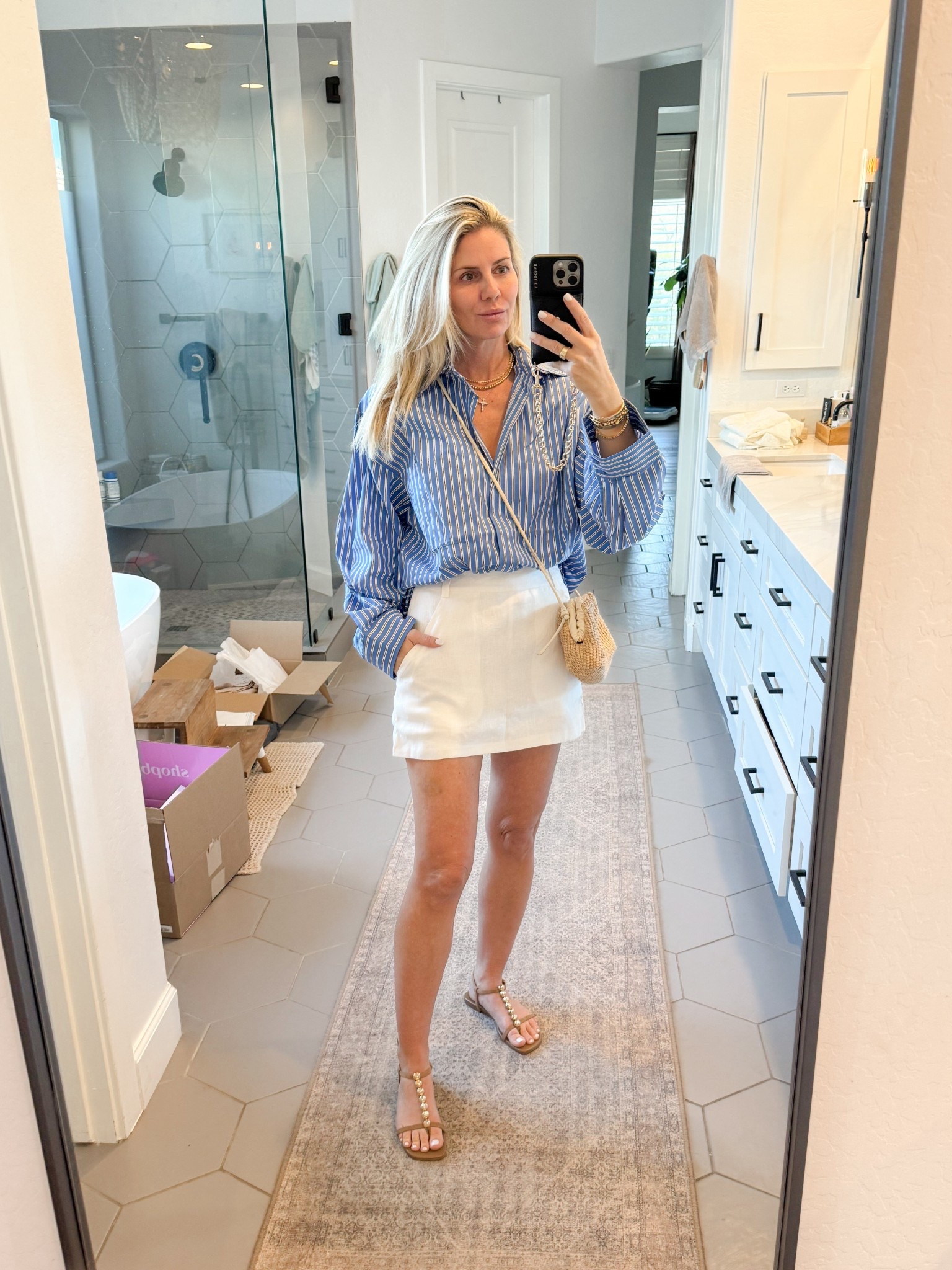 Love an oversized striped button down pairs with a linen skirt  

#LTKSeasonal #LTKOver40 #LTKootd