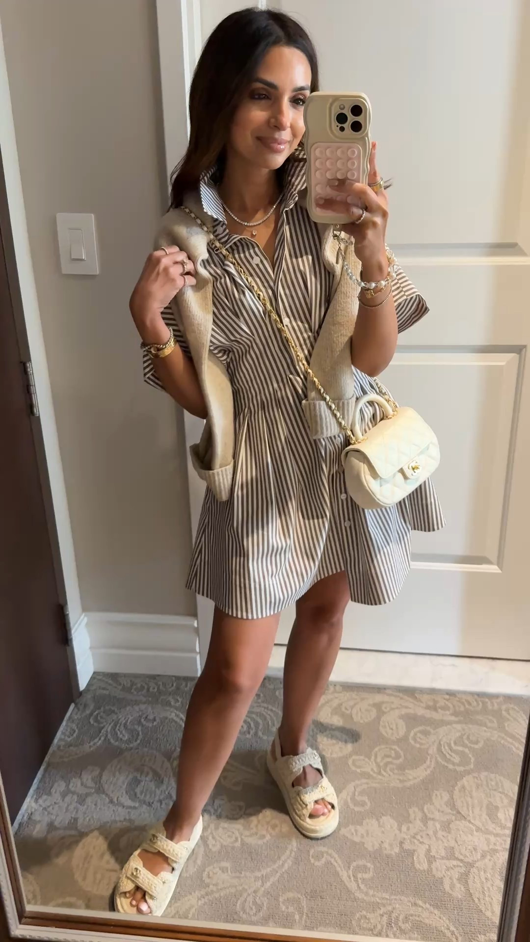 My perfect summer dress! Changed into this today when we arrived in Montreal for an afternoon/evening of walking around and having dinner and drinks, Wearing an xs petite for size ref, runs TTS. Sandals are chanel crochet dad sandals I got in Paris this year, I linked my similar styled Steve Madden sandals that are. DREAM for walking around the city!! 

#LTKTravel #LTKStyleTip