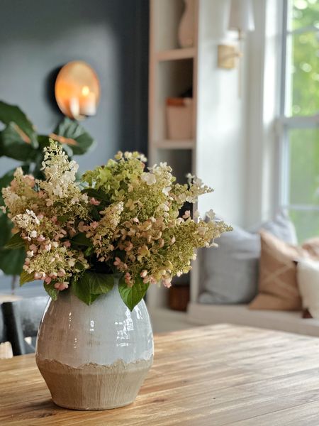 It’s been a dark and rainy day and I’ve LOVED it. 😍🌧️ It was a great day to cut some of our limelight hydrangeas without a bunch of bugs hanging around. I absolutely love their pink, green and creamy tones this time of year. 


#LTKunder100 #LTKhome #LTKSeasonal