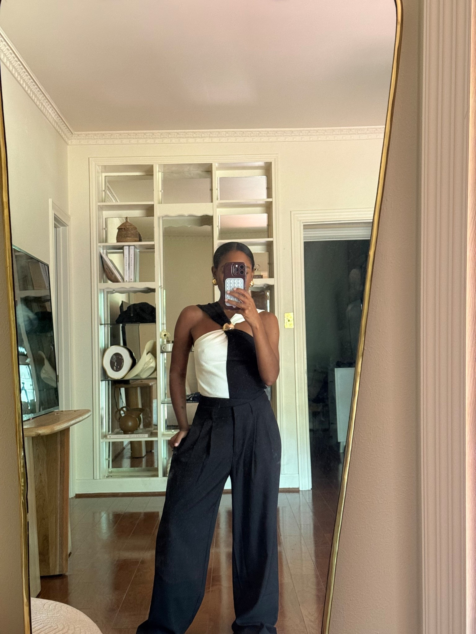 Black and white halter top and baggy trousers 

#LTKWorkwear #LTKStyleTip