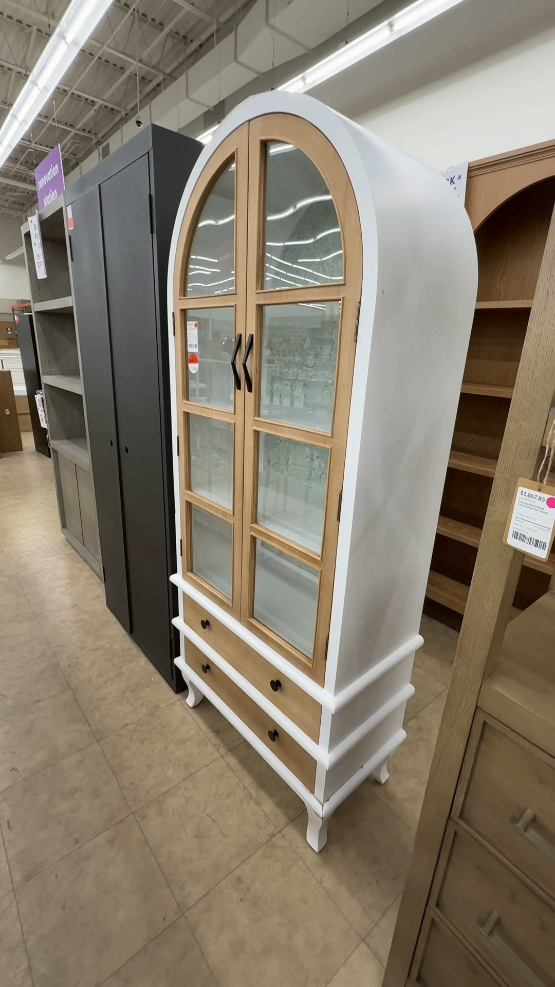 Storage meets style! 🤍 This arched glass cabinet features a beautiful two-tone design with a white frame and warm brown doors. 🤎 Tons of storage with spacious shelving up top and drawers on the bottom, plus a subtle floral pattern inside that adds a unique touch. 🌼 A stylish glass cabinet that’s as functional as it is eye-catching. Linked it here!#GlassCabinet #StorageCabinet #ArchedCabinet

#LTKHome #LTKSaleAlert