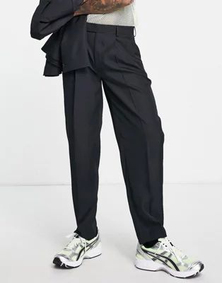 ASOS DESIGN oversized tapered suit pants in black | ASOS (Global)