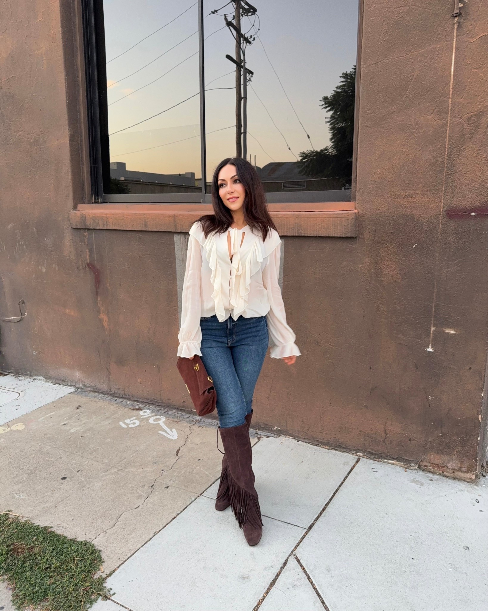 On Fridays, we rock boho sleeves and fun boots! ✨ I absolutely adore this boho top. It’s giving Chloe, and it’s also incredibly affordable. I wear size small for a slightly oversized fit. The jeans are classic skinny jeans, which are my go-to combination with knee boots. Both the shoes and the bag are suede, which is a huge trend this season!

#LTKPetite #LTKootd #LTKFindsUnder50