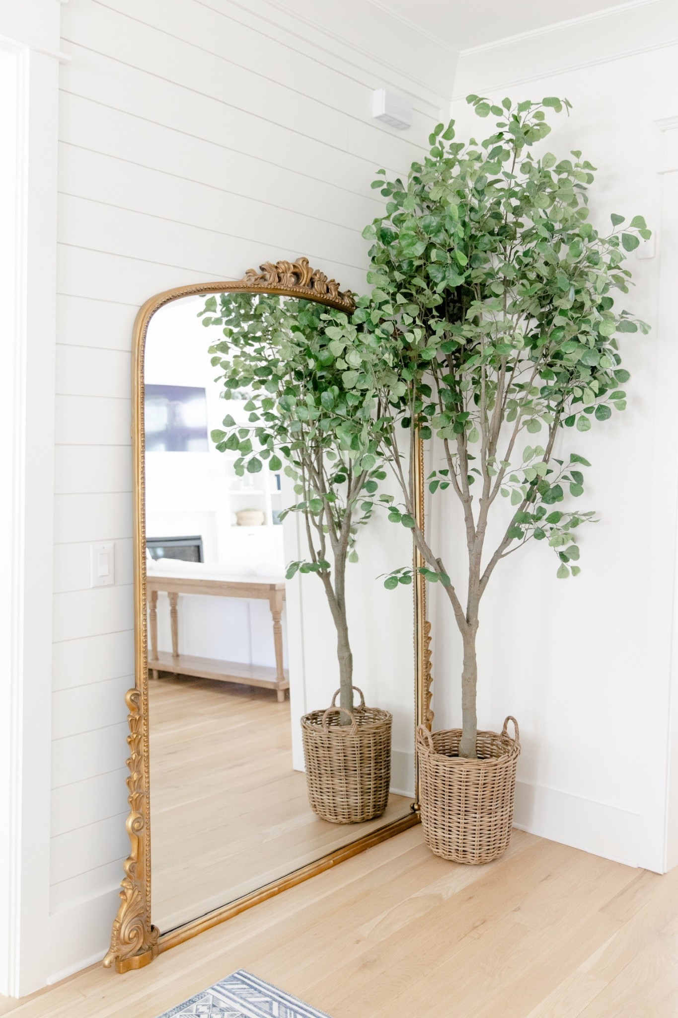 This is such a cozy corner of our home. I love the size of this mirror! Stunning paired with the tree

#LTKHome #LTKSeasonal
