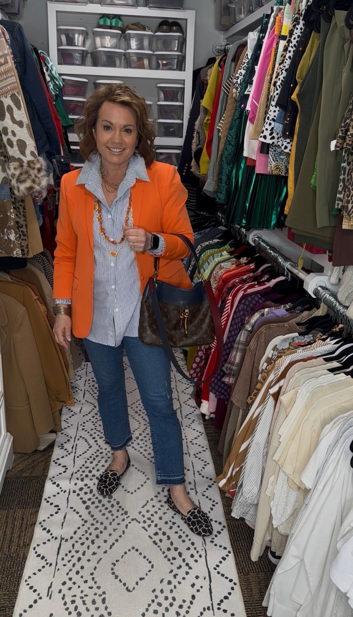 Bright blazer + classic denim = one of the easiest outfit formulas.

This outfit pairs a bold orange blazer with a striped button-down shirt and straight leg denim for a polished but comfortable everyday look. Patterned loafers and a classic handbag add interest while keeping the outfit timeless.

Blazers are one of the best wardrobe staples because they instantly elevate basics like jeans and a button-down shirt. This look works for casual workdays, lunch with friends, or running errands while still looking put together.

orange blazer outfit, blazer outfit with jeans, striped button down outfit, straight leg jeans outfit, women over 40 style, women over 50 fashion, casual chic outfit, everyday polished outfit, classic wardrobe staples, elevated casual style, effortless outfit formula, modern classic style

#LTKOver40 #LTKootd #LTKSeasonal