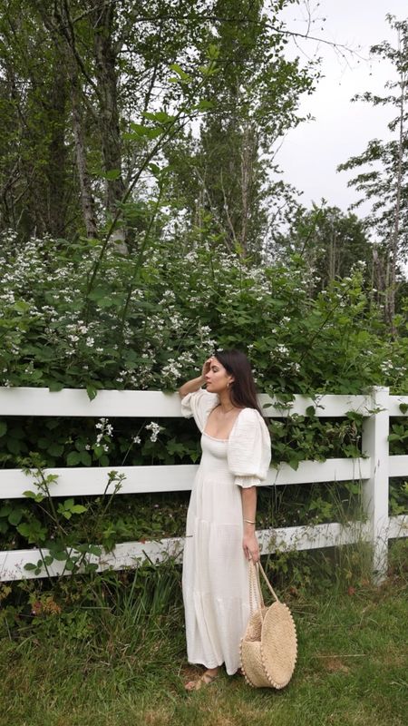Cute cottage style summer dress. @sarahchristine wearing Nothing Fits But Kiko Dress Soft muslin dress with puffed sleeves, smocked chest and sleeves in Seattle, Washington. 

SPRING DRESS. Spring Maxi Dress with Long Sleeve, Smocked Waist, and Flowy Tiered Midi Dress. Casual Dress.

#LTKFind #LTKSeasonal #LTKstyletip