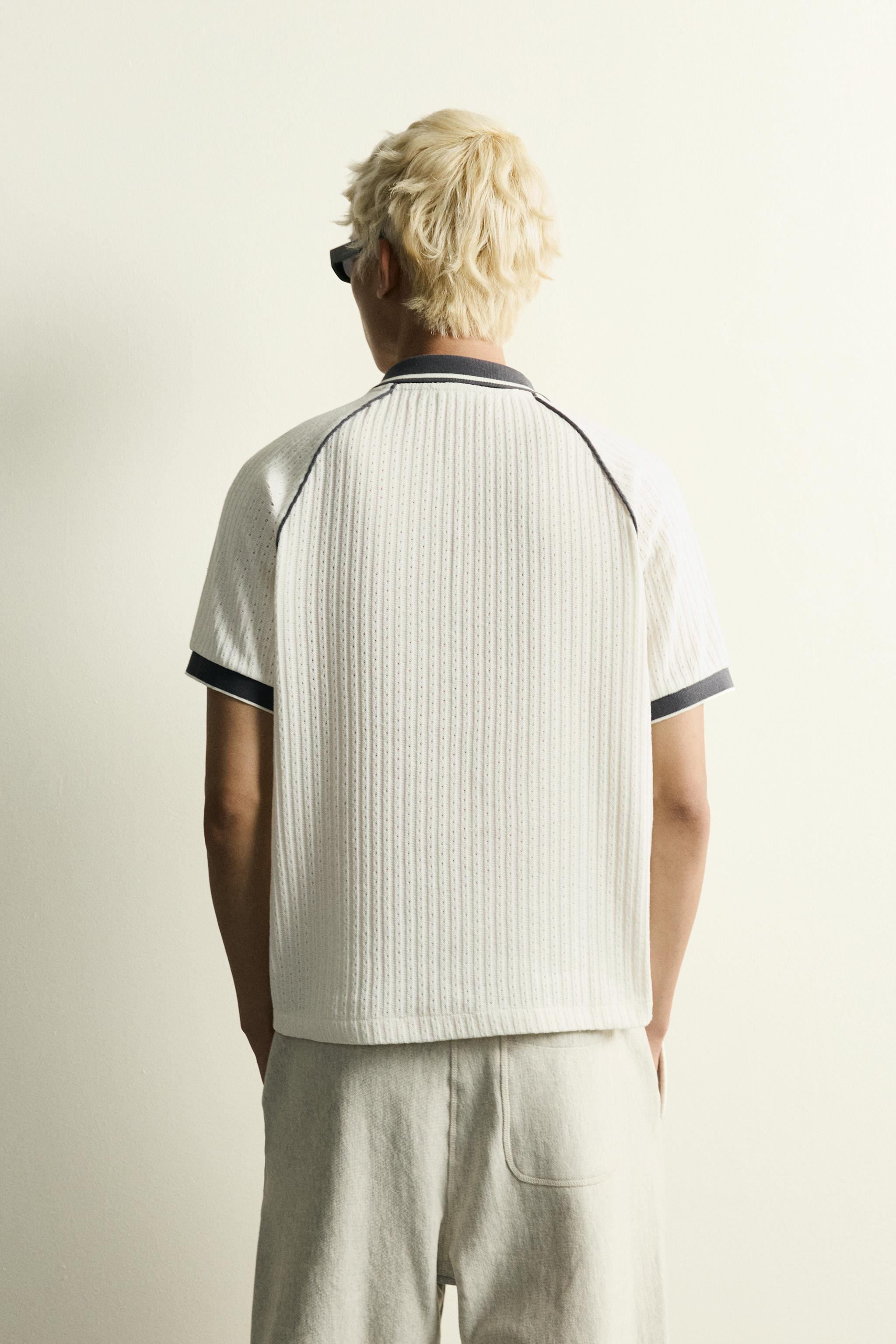 Model height: 189 cmRegular fit polo shirt in a cotton blend fabric. Featuring a regular collar w... | Zara UK