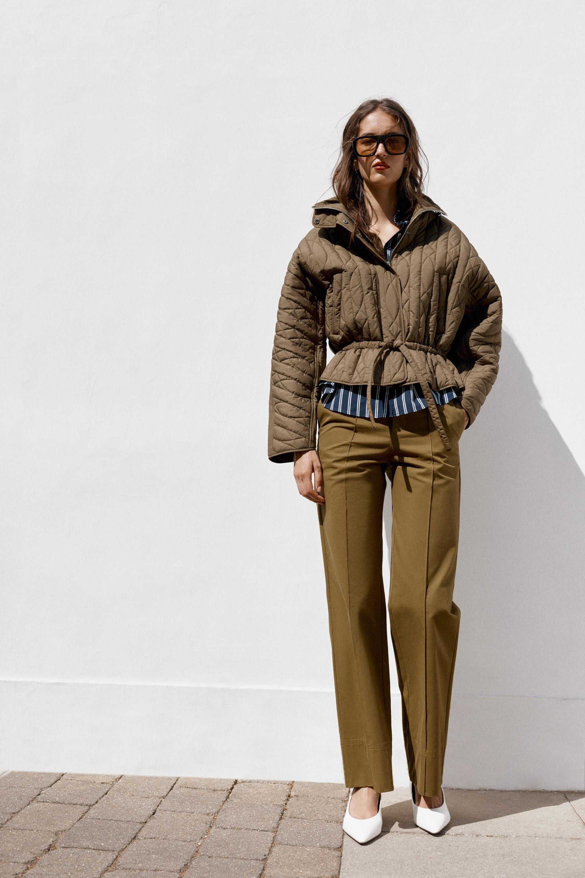 Puffer jacket featuring a stand-up collar with elastic drawstrings and long sleeves with snap-but... | Zara US