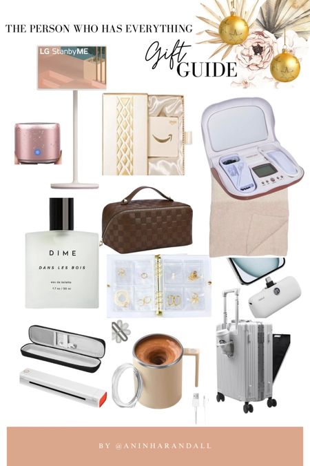Gift guide for the person who has everything | Christmas gifts | Holiday gifts |  Portable and take everywhere TV | Fancy and Wrapped Gift Card | Travel Makeup Bag | Microdermabrasion at home | Skincare | Clean Perfume | Jewelry Storage and Organizer | Portable Travel Printer without Cartridge | Self Stirring Thermal Mug | Carry On Luggage with charger and cup holder | Gifts for her | Gifts for Moms, Grandmas | Teachers | Prices are subject to change | #paidlink | 

#LTKGiftGuide #LTKover40 #LTKHoliday