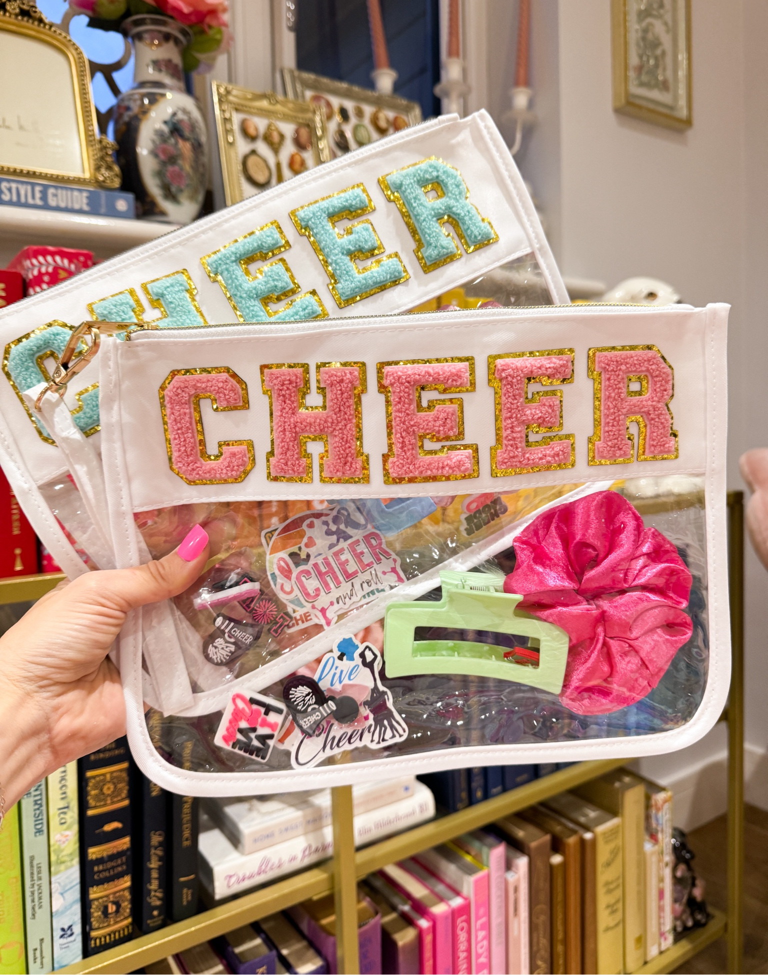 Cheer gifts. Competition Cheerleading gift bags. Goody bags. Cheer squad gifts. Clear cosmetic bags, croc charms, stickers, hair clips & scrunchies. Amazon finds. Cheer Mom. 

#LTKfamily #LTKkids