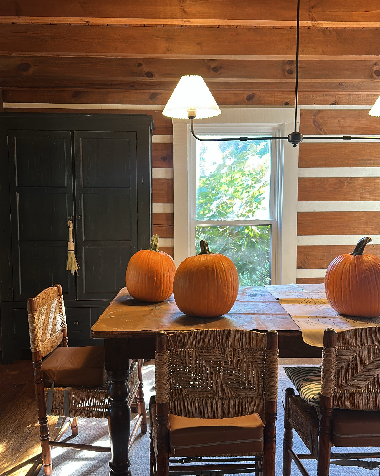 fall things like carving pumpkins in the dining room 

#LTKHome #LTKSeasonal #LTKHalloween