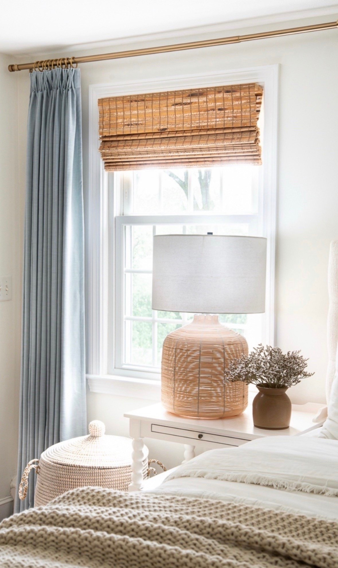 Give your bedroom a spring refresh with these pretty blue curtains and rattan lamp! Plus these woven shades bring the perfect amount of warmth!

#LTKHome
