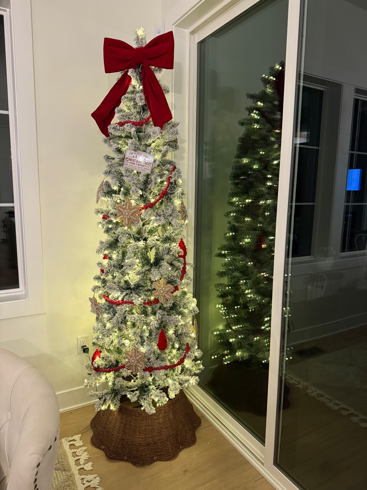 Red bow and gingerbread Christmas tree! White flocked pencil tree, gingerbread ornament, red bow tree topper! 

#LTKSeasonal #LTKHoliday #LTKHome