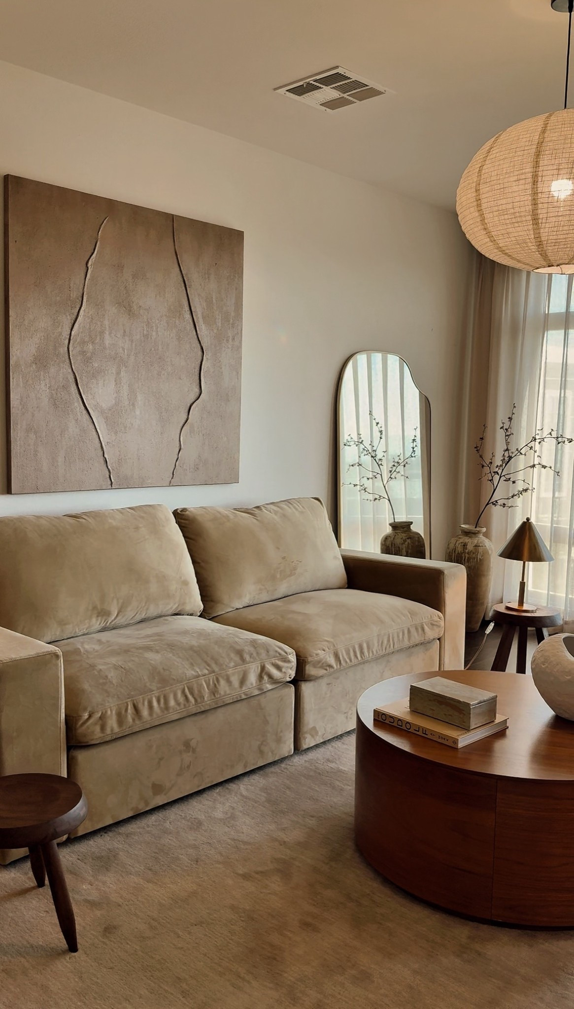 Living room view ✨
Wall art - Meson Art
Linen Lamp shade - Zara Home
Camel beige performance velvet modular couch, organic mirror, lamps, sheer curtains, vase, faux stem, coffee tablee

#LTKHome #LTKSeasonal #LTKStyleTip