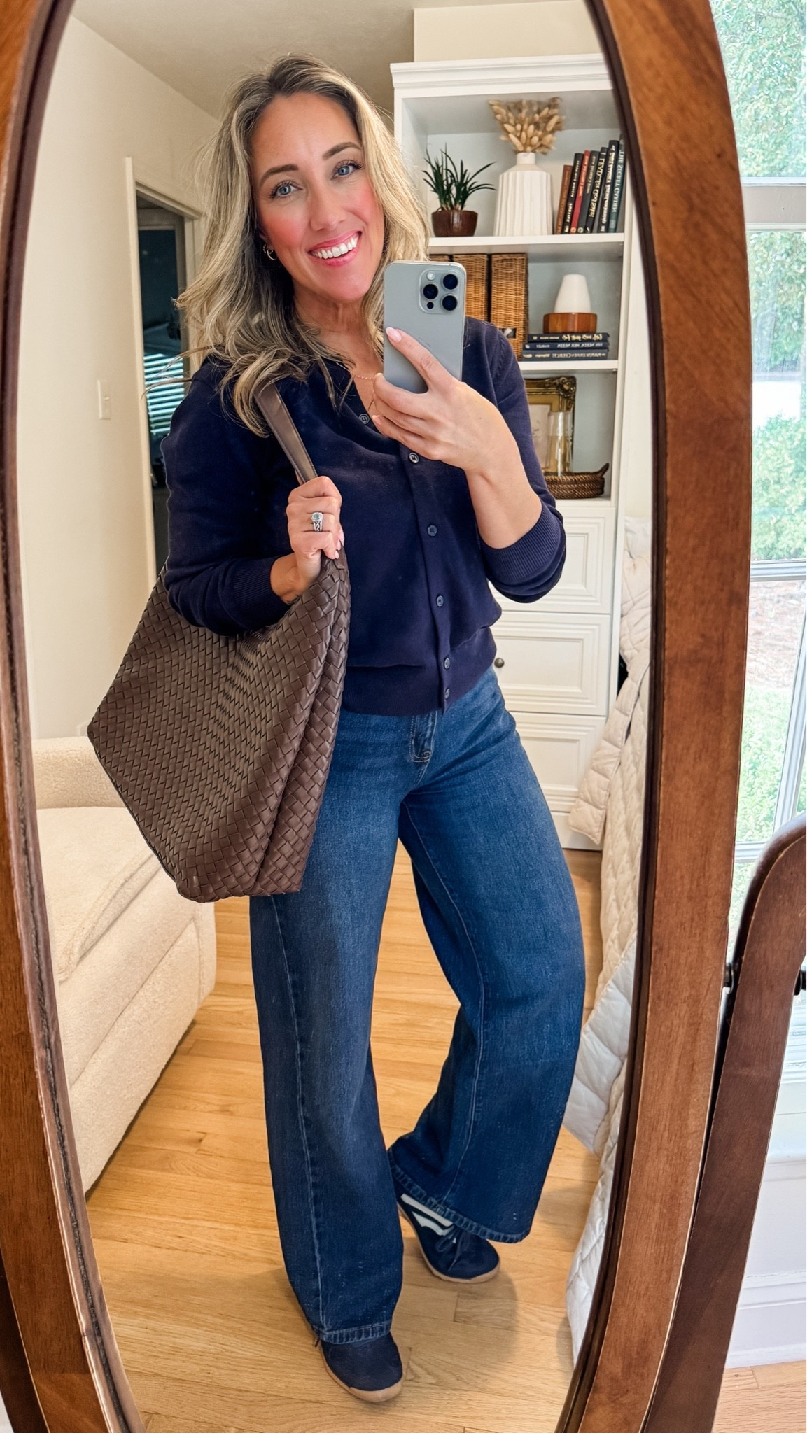 An entire Walmart fall outfit for under $100 🤎 Jeans, cardigan, sneakers AND bag—my total was just over $87 before tax!

The quality is what sold me. These wide-leg jeans remind me of Levi’s or Madewell, and the navy cardigan has that substantial fabric I’d expect from Banana Republic. Easy pieces that look polished together and work with so much already in my closet.

And this brown woven tote 😍 I’ve been looking for a gorgeous bag that actually fits my laptop and everyday essentials, and this one does beautifully. It comes in several colors, too!

Linking all four pieces so you can check current prices, sale offers and available sizes. Save this affordable fall outfit for your next everyday outfit idea!

#WalmartFashion #FallOutfits #AffordableStyle