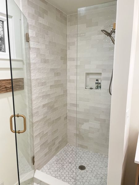 We saved thousands of dollars in our master bathroom renovation.  Here are the product links we used in our master shower.  

Chloe tile.  Handmade subway tile.  Shower head.  Shower door.  Small hexagon tile.  

#LTKhome #LTKFind