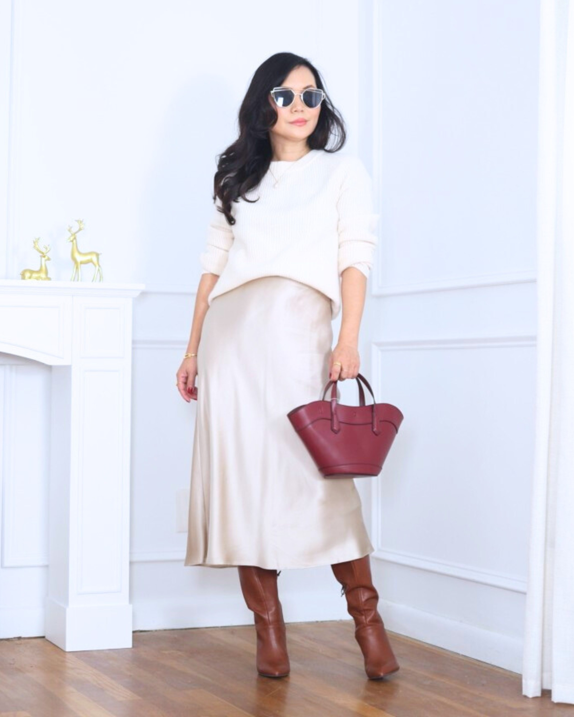 Keeping it sleek and cozy with this cashmere sweater and silk midi skirt from Quince, paired with tall heeled boots from Loft. It’s the kind of outfit that makes dressing up feel effortless but still so put-together. I’m 5’2, wearing size XS.

#LTKOver40 #LTKPetite #LTKHoliday