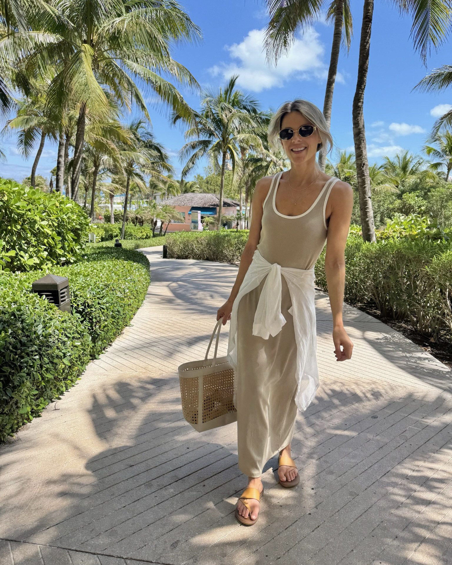 Vacation outfit of the day! This dress is so light and perfect for warm weather. Plus just $20 at Target!

#LTKTravel #LTKItBag #LTKStyleTip