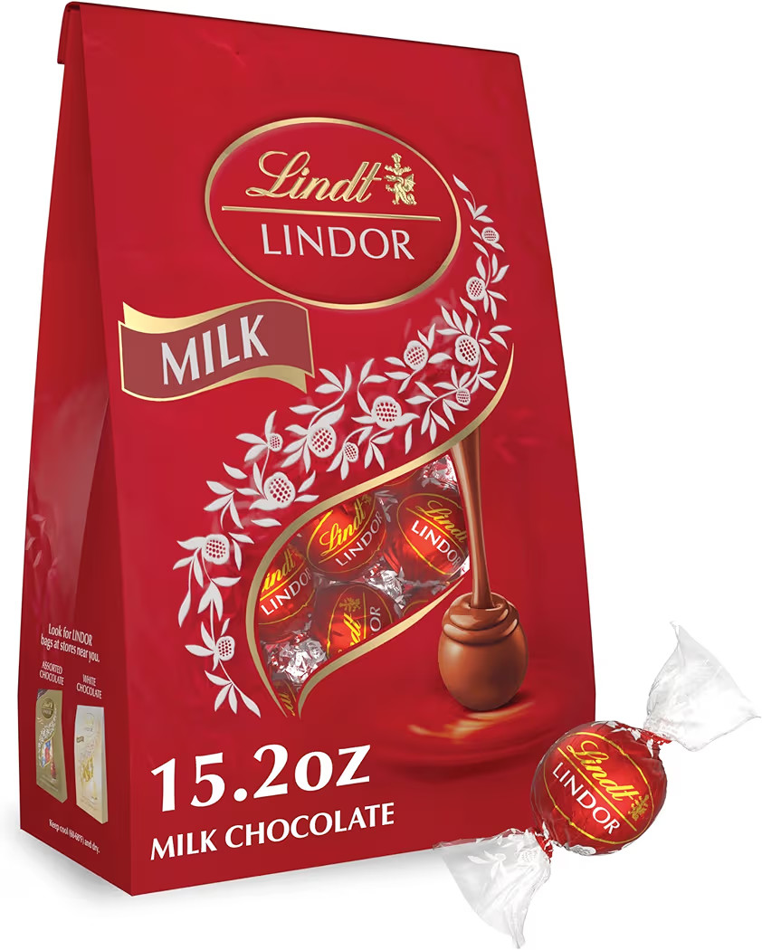 Lindt LINDOR Milk Chocolate Candy Truffles, Milk Chocolate with Melting Truffle Center, 15.2 oz. ... | Amazon (US)
